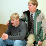 FILE: Zach Snarr's brothers, (l to r) Levi, 17  and Trent, 23 wait outside courtroom for the sentencing of Benvenuto.  (Kristan Jacobsen)