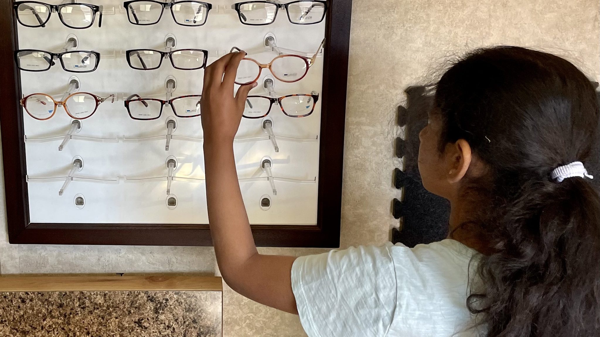 Canyon School District student picks glasses...