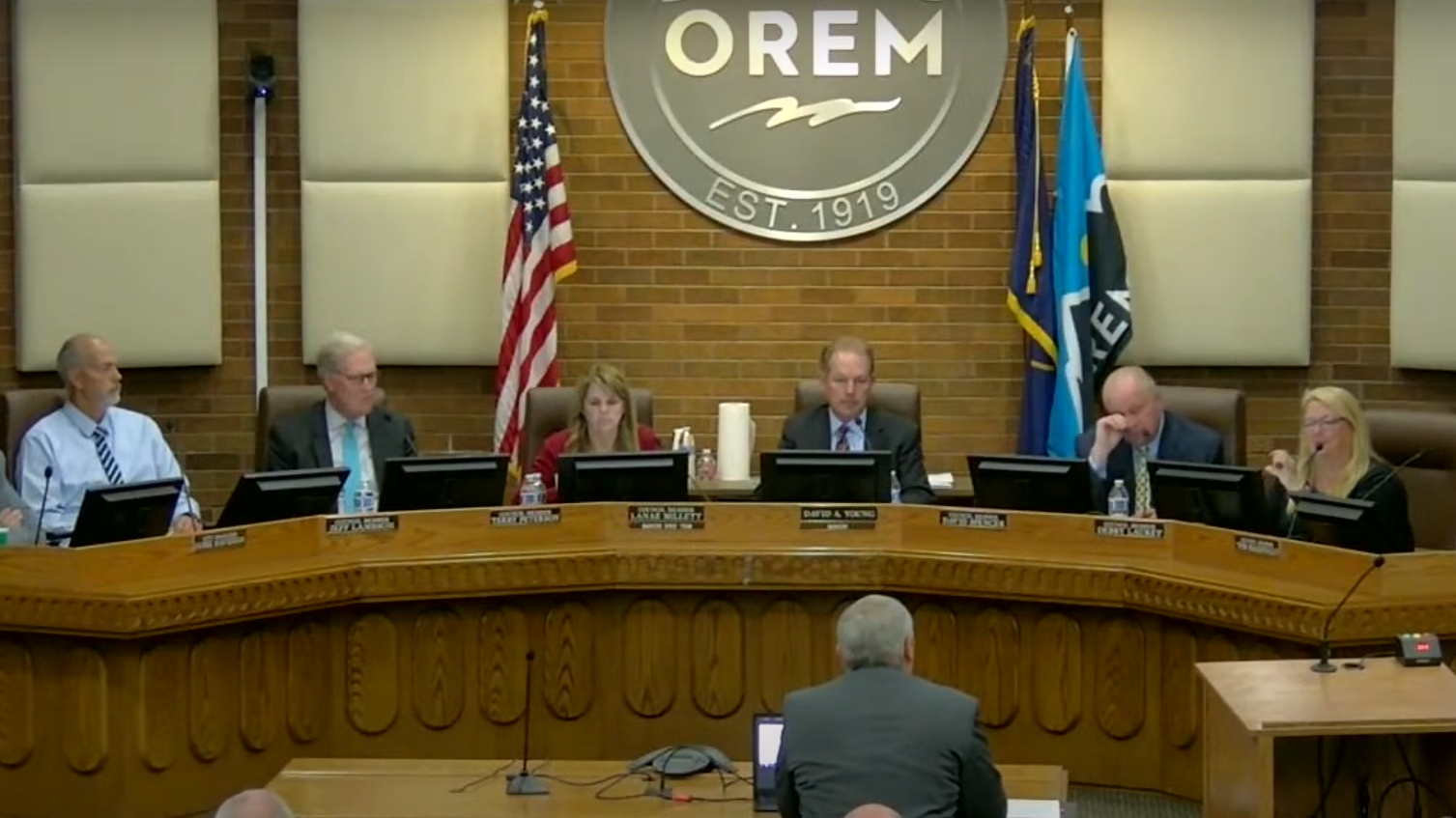 Orem city council members are pictured...