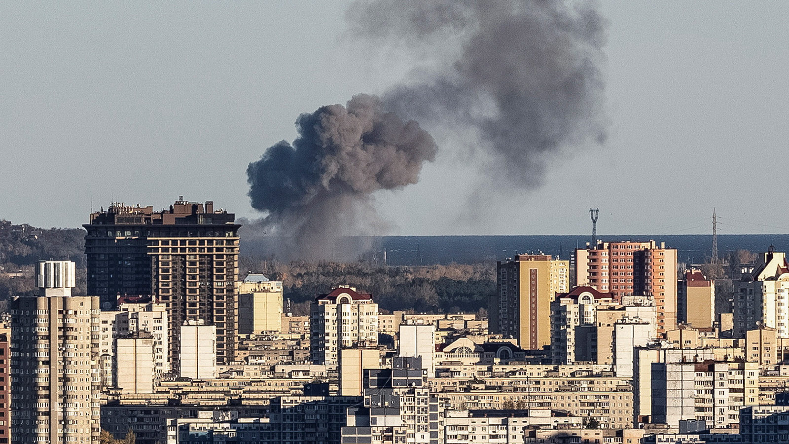 Smoke rises on the outskirts of Kyiv during a Russian missile attack on Oct. 31. Photo credit: Gleb...
