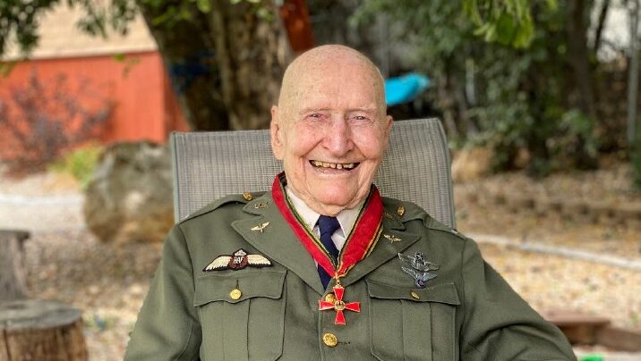 Gail Halvorsen, the Berlin Candy Bomber, poses for a photo in the backyard of his Provo home days b...