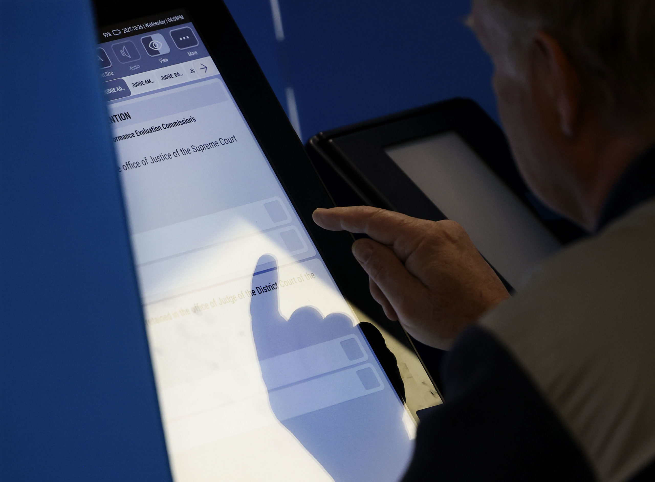 A man votes in the in-office early voting room in the south building of the Salt Lake County Govern...