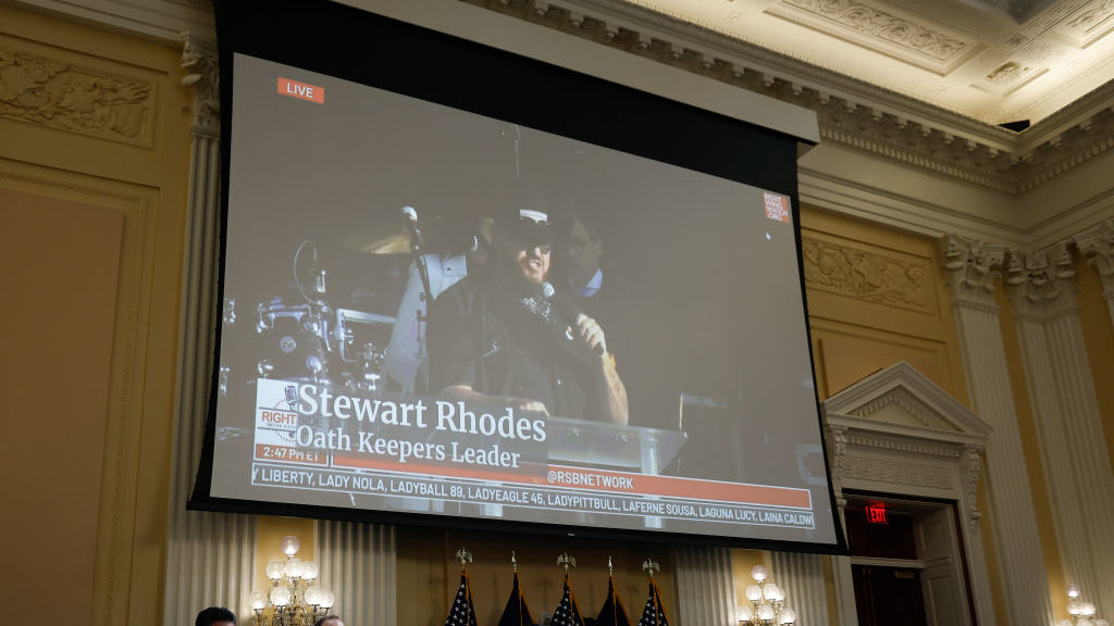 FILE: Oath Keepers founder Stewart Rhodes appears on a video screen above members of the Select Com...