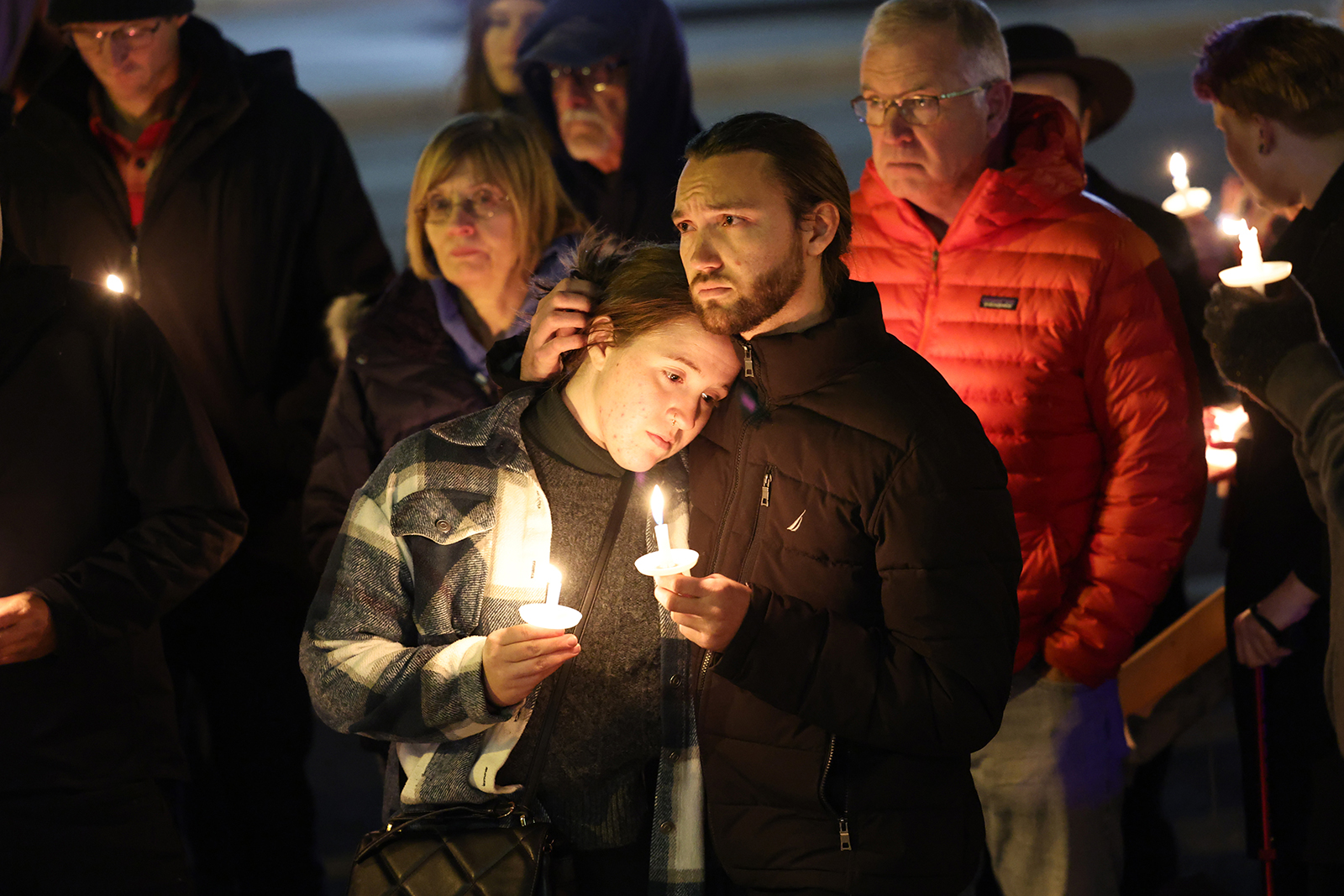 COLORADO SPRINGS, COLORADO - NOVEMBER 20: People hold a vigil at a makeshift memorial near the Club...