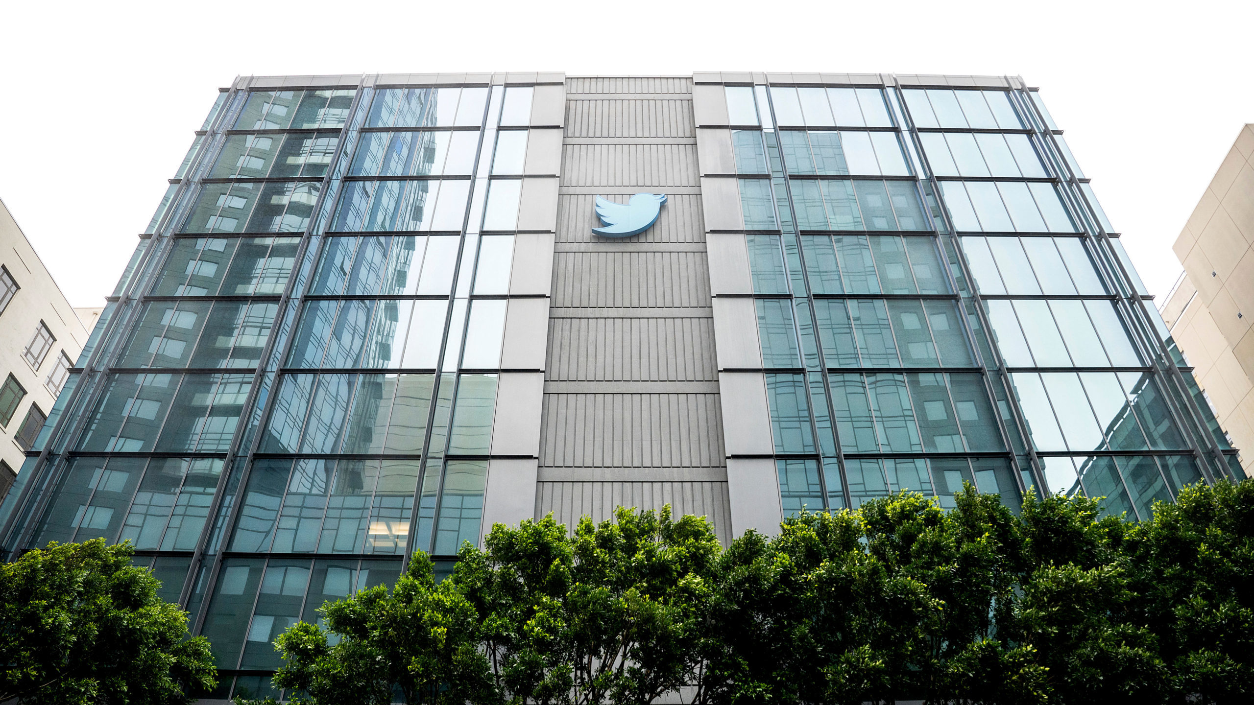 A Twitter logo hangs outside the company's San Francisco offices on Tuesday, Nov. 1, 2022. (AP Phot...