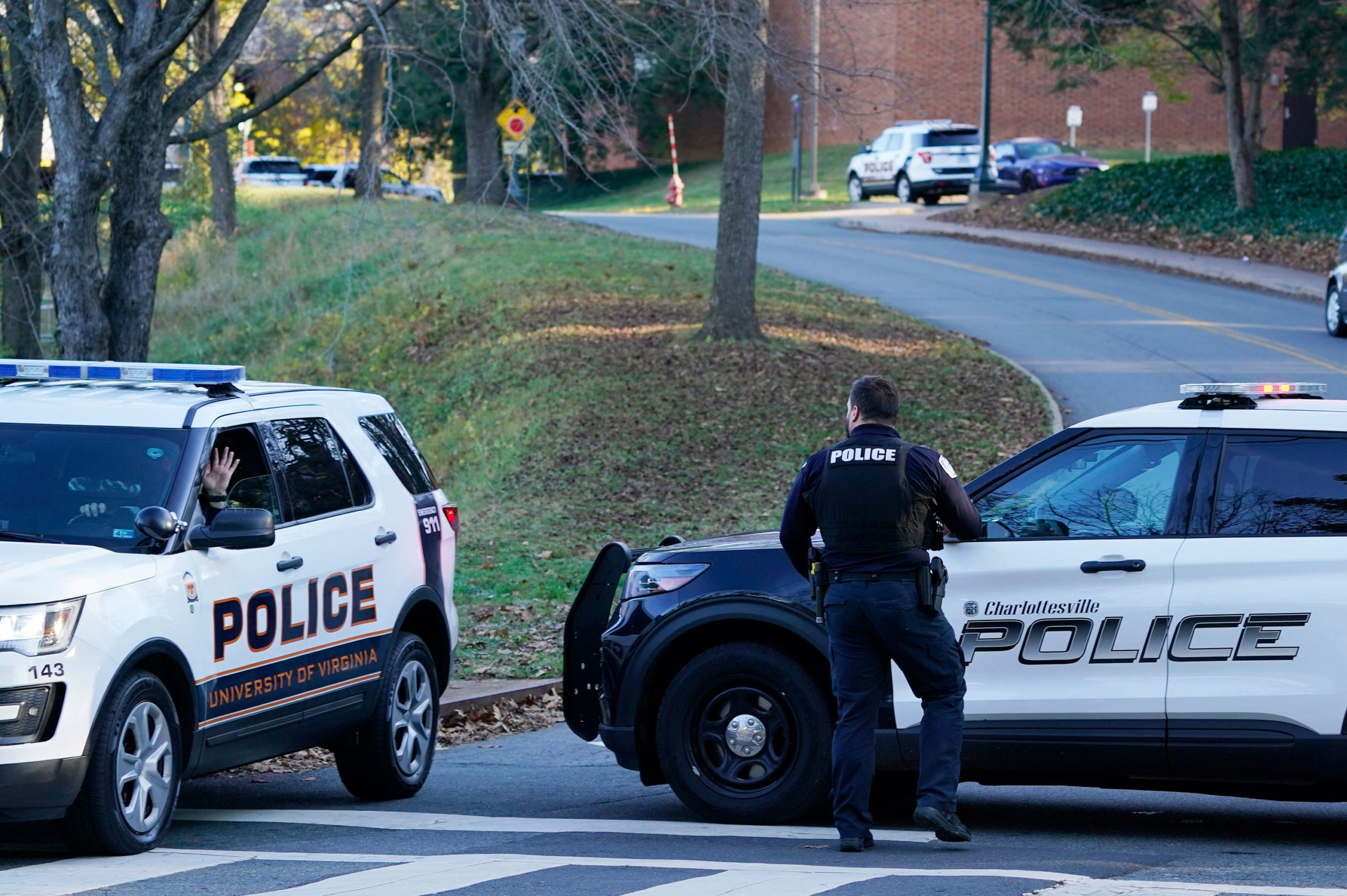 Charlottesville police secure a crime scene of an overnight shooting at the University of Virginia,...