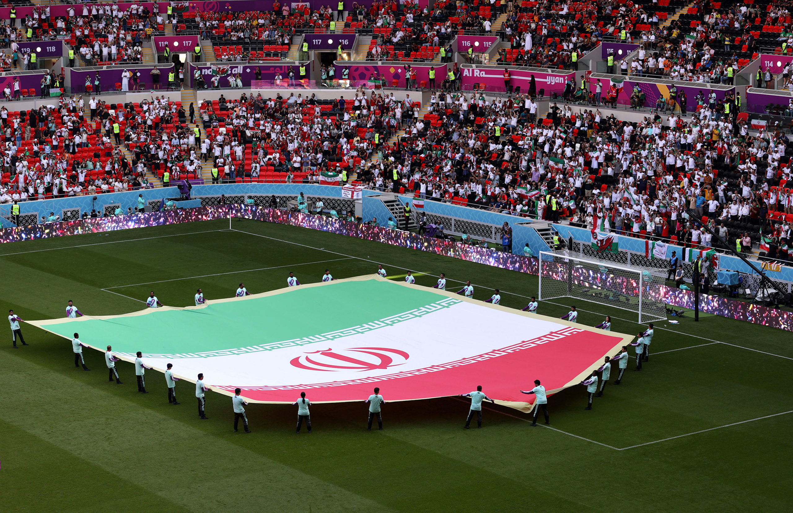 DOHA, QATAR - NOVEMBER 25: A giant flag of IR Iran on the pitch prior to the FIFA World Cup Qatar 2...