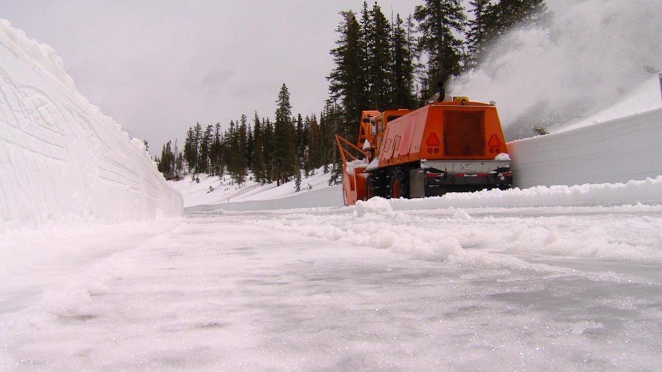 a plow is pictured on mirror lake highway...