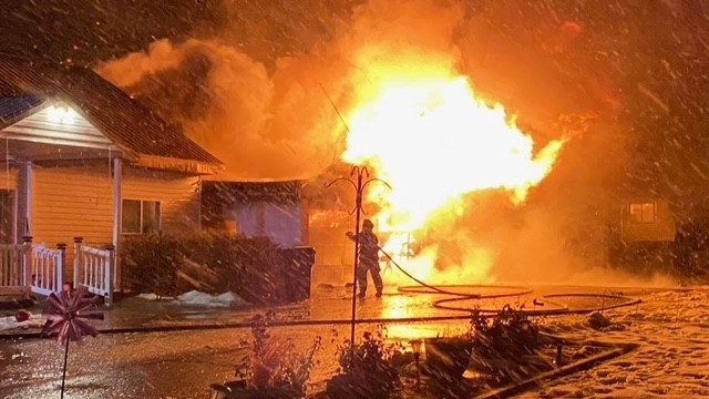 A fire consumed a garage and car in Mapleton on Dec. 28, 2022. (Mapleton Utah Fire Dept.)...