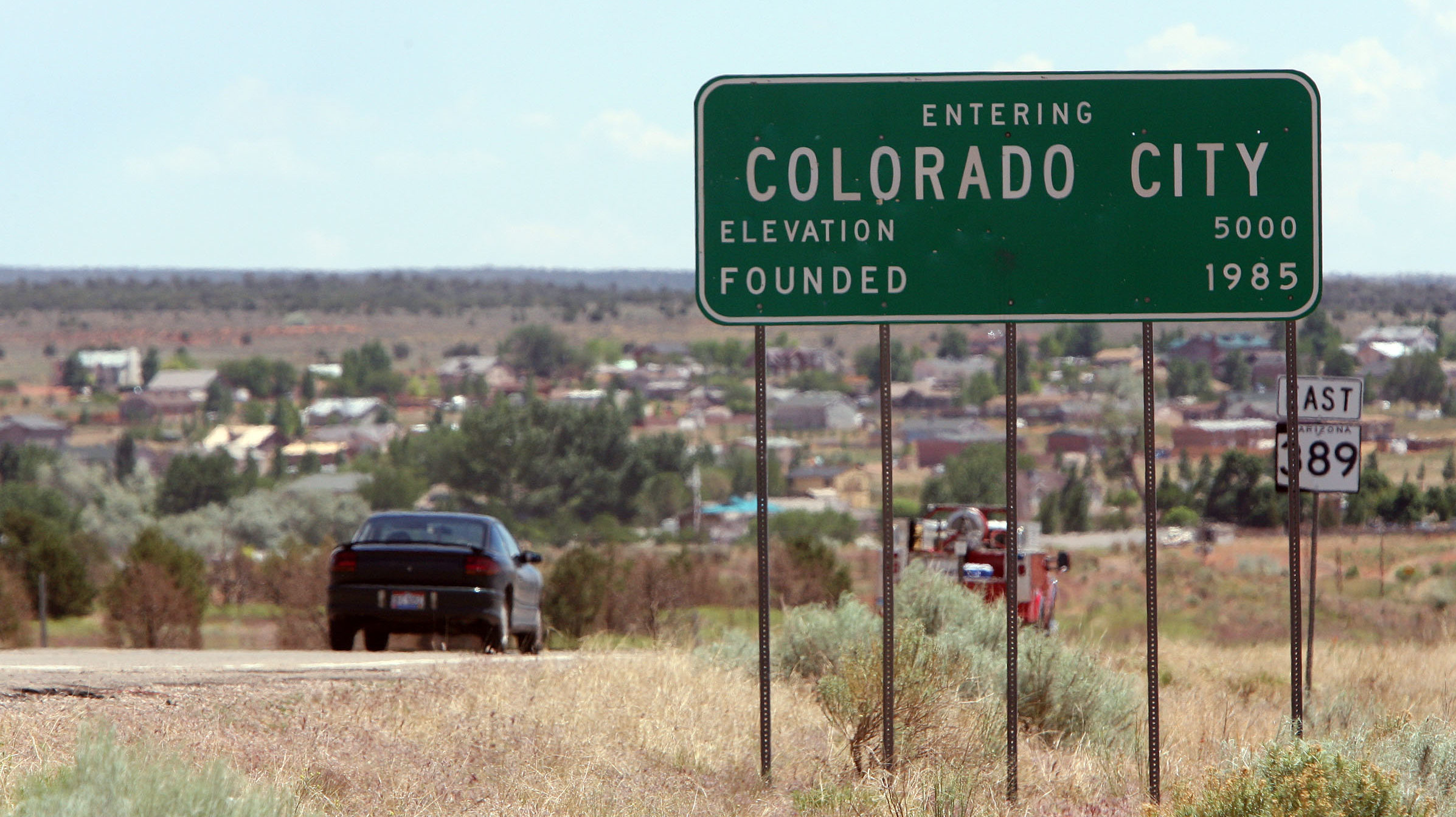 polygamist sect community colorado city town sign...