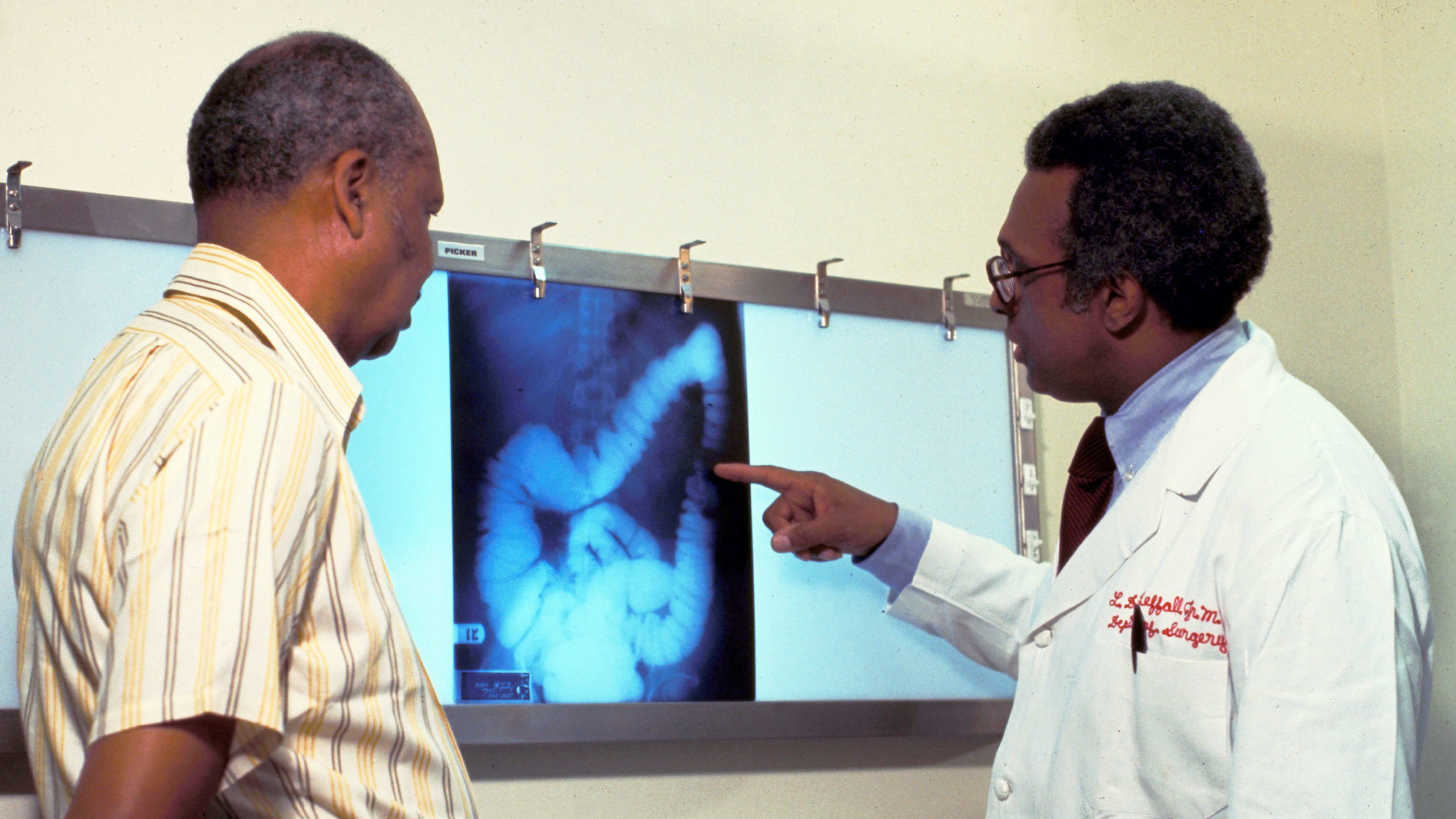 Doctors analyze a screening of a colon...