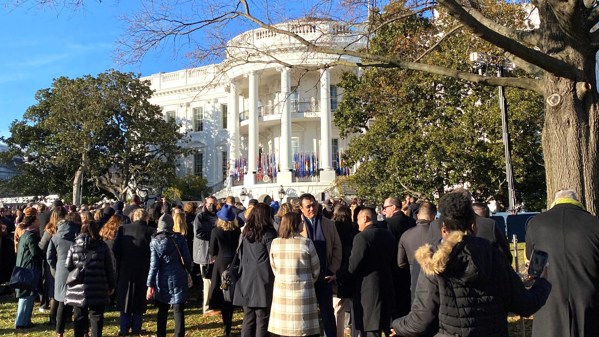 people are pictured at the white house as biden signs the respect for marriage act...