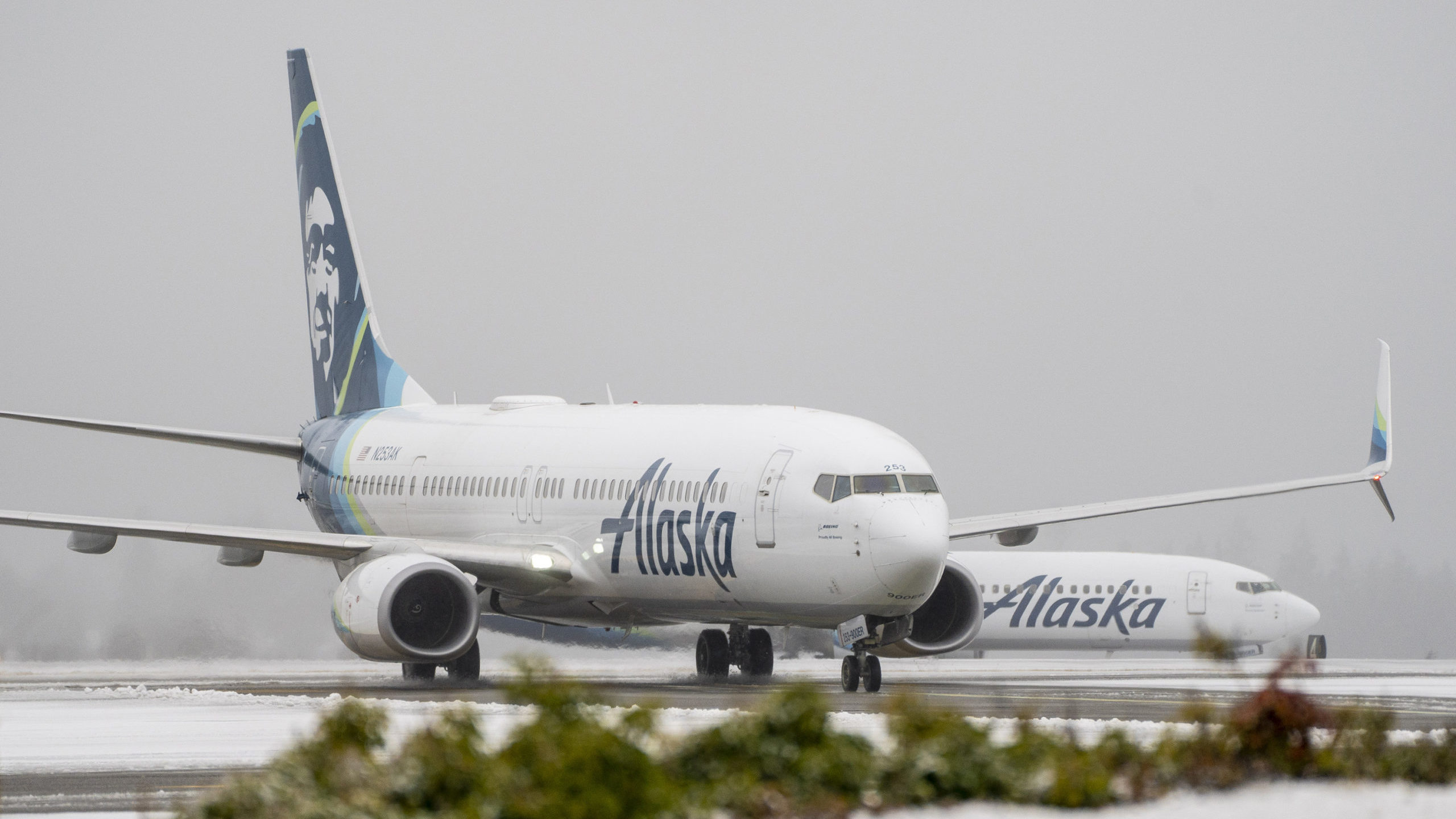 Alaska Airlines planes during a snow storm at Seattle-Tacoma International Airport (SEA) in Seattle...