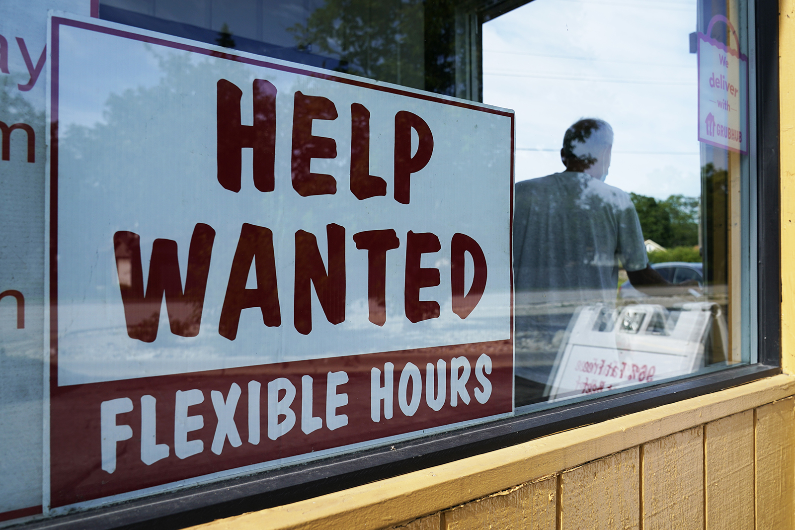 Help wanted sign is displayed in Deerfield, Ill., Wednesday, Sept. 21, 2022.  The number of availab...