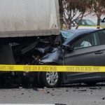2 dead after crash into parked box truck