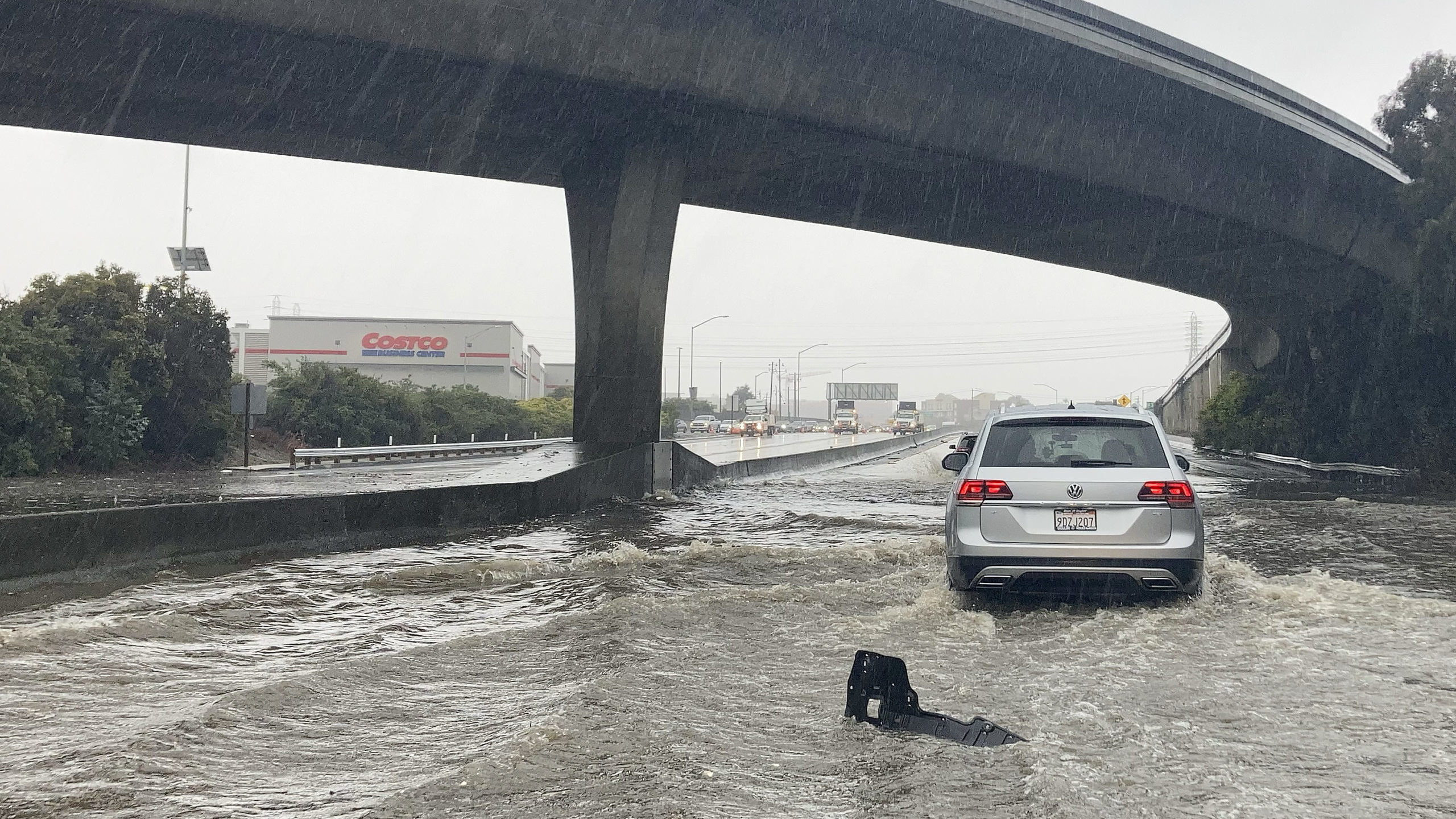 A powerful storm brought drenching rain or heavy snowfall to much of California on Saturday, snarli...