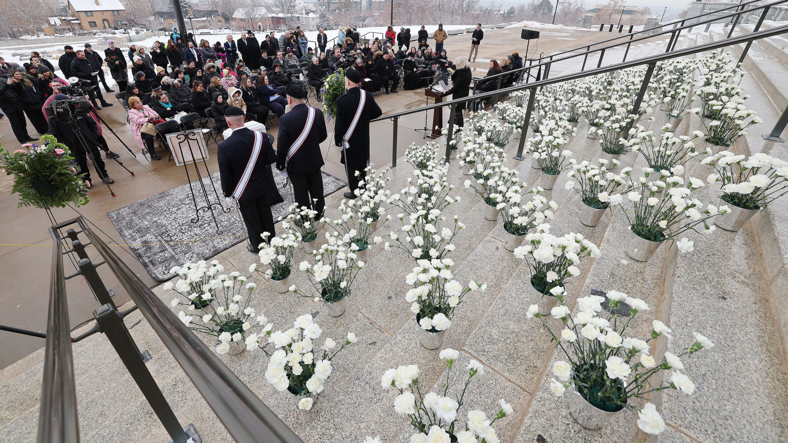 White carnations representing each of the 1,746 unborn babies that were aborted in Utah in 2022 are...