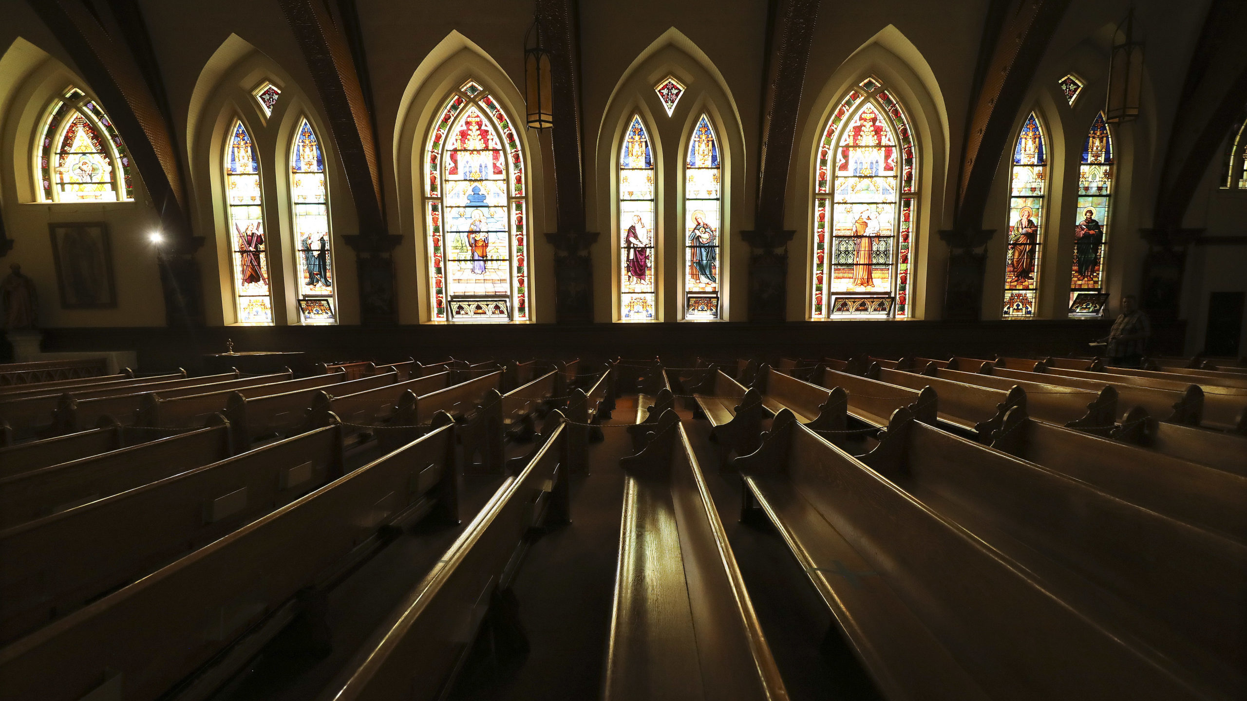 Light shines through the stained glass windows in St. Joseph Catholic Church in Ogden on Tuesday, J...