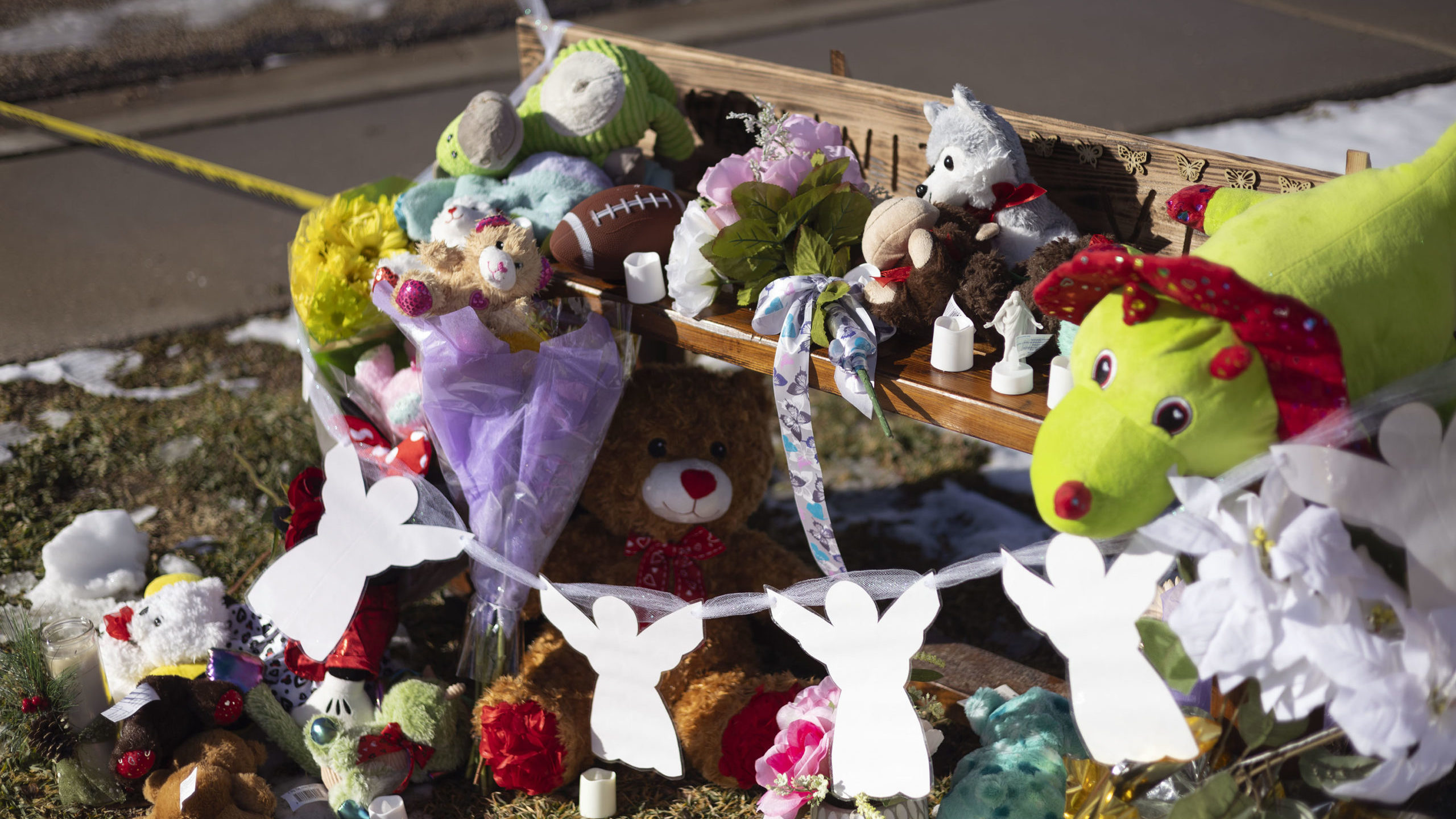 a memorial with stuffed animals is pictured in front of the Haight home, a lethality assessment is ...
