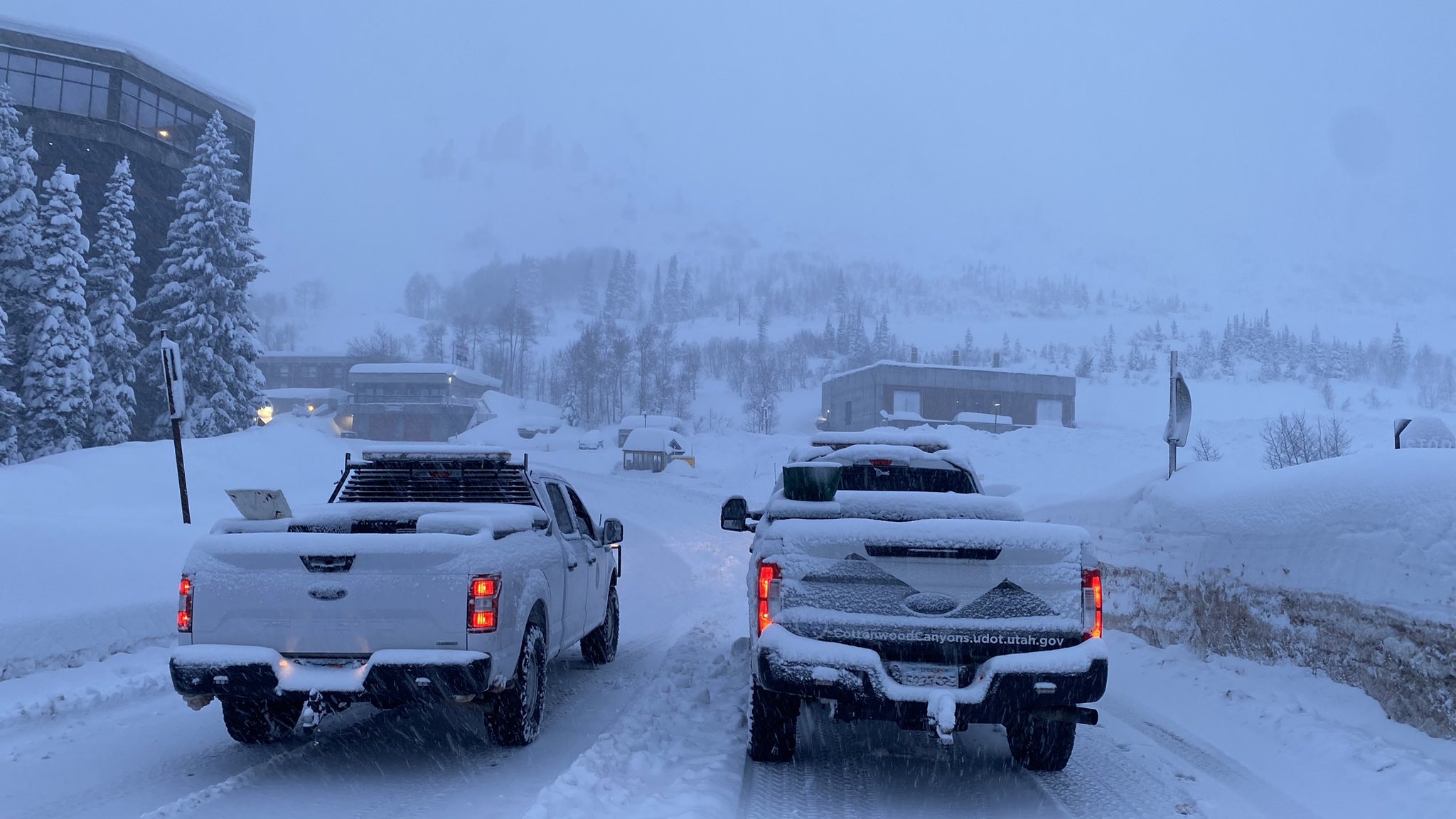 New snow was falling again across Utah on Sunday morning, closing canyons for avalanche mitigation...