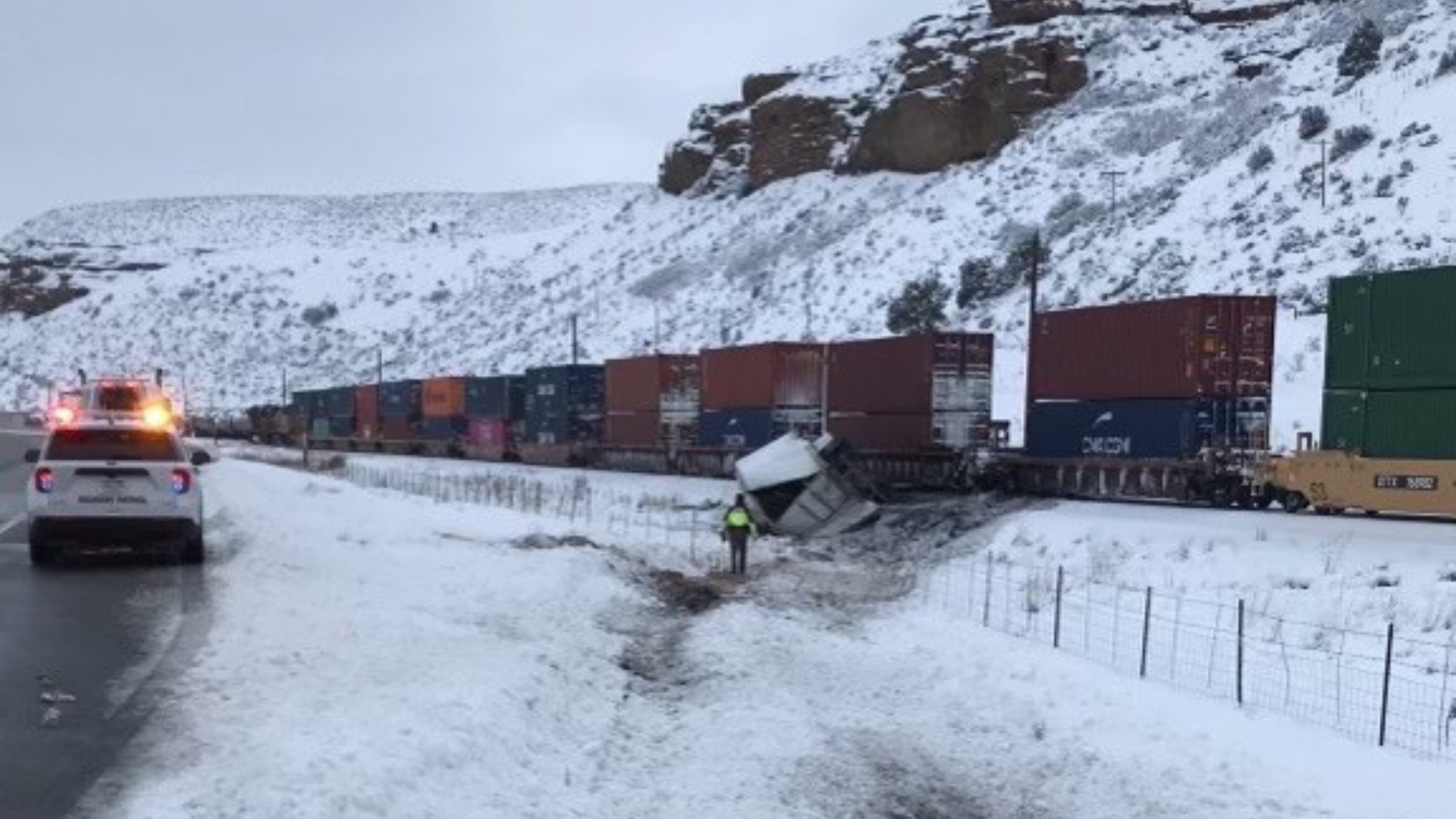 The Utah Highway Patrol said the semi-truck went off the roadway and stopped on the train tracks....