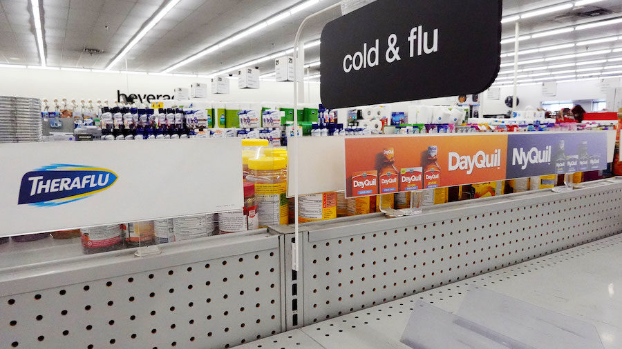 BURBANK, CALIFORNIA - DECEMBER 06: A cold and flu medicine shelf is empty in a CVS pharmacy on Dece...