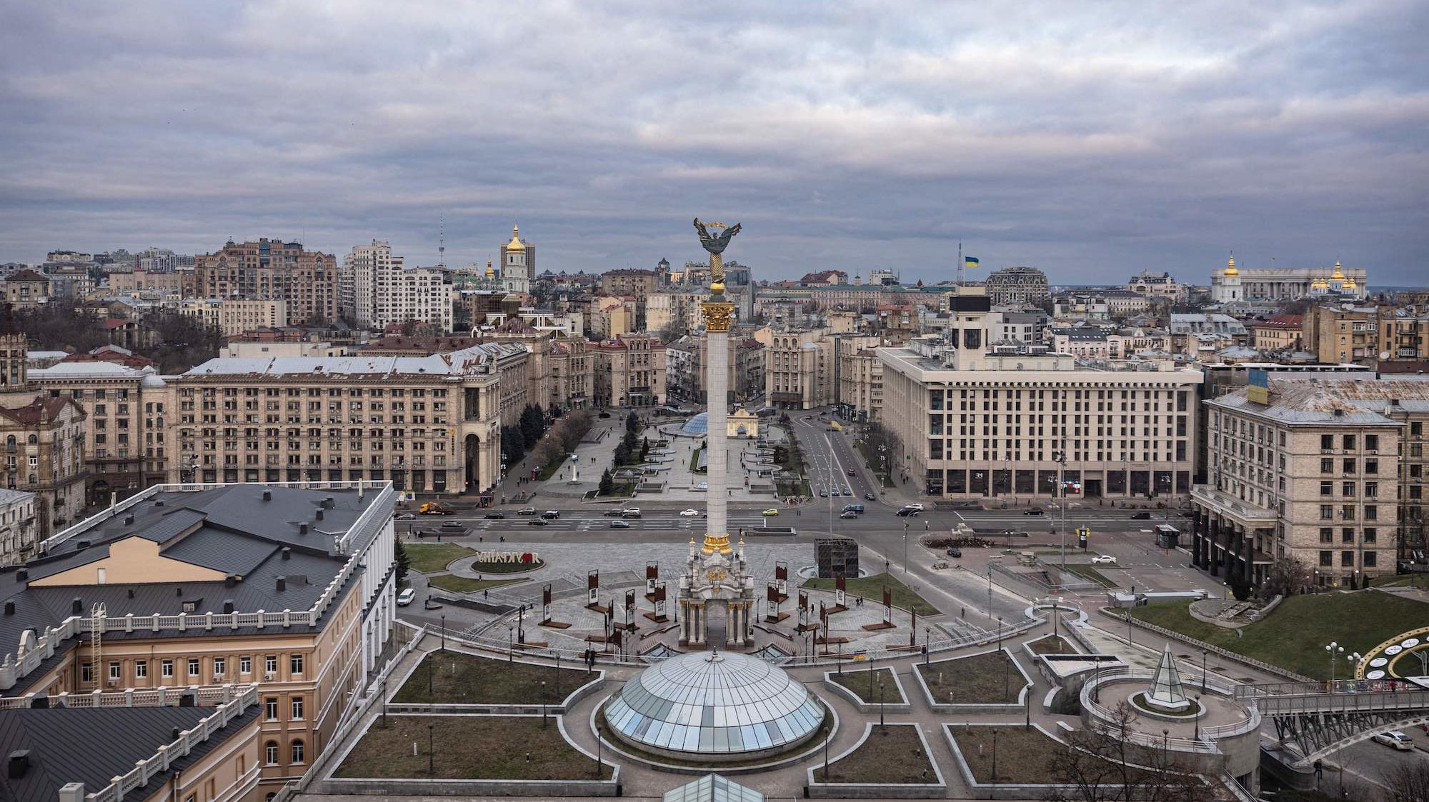 This photograph shows a general view of the Maidan square and the skyline of the Ukrainian capital ...
