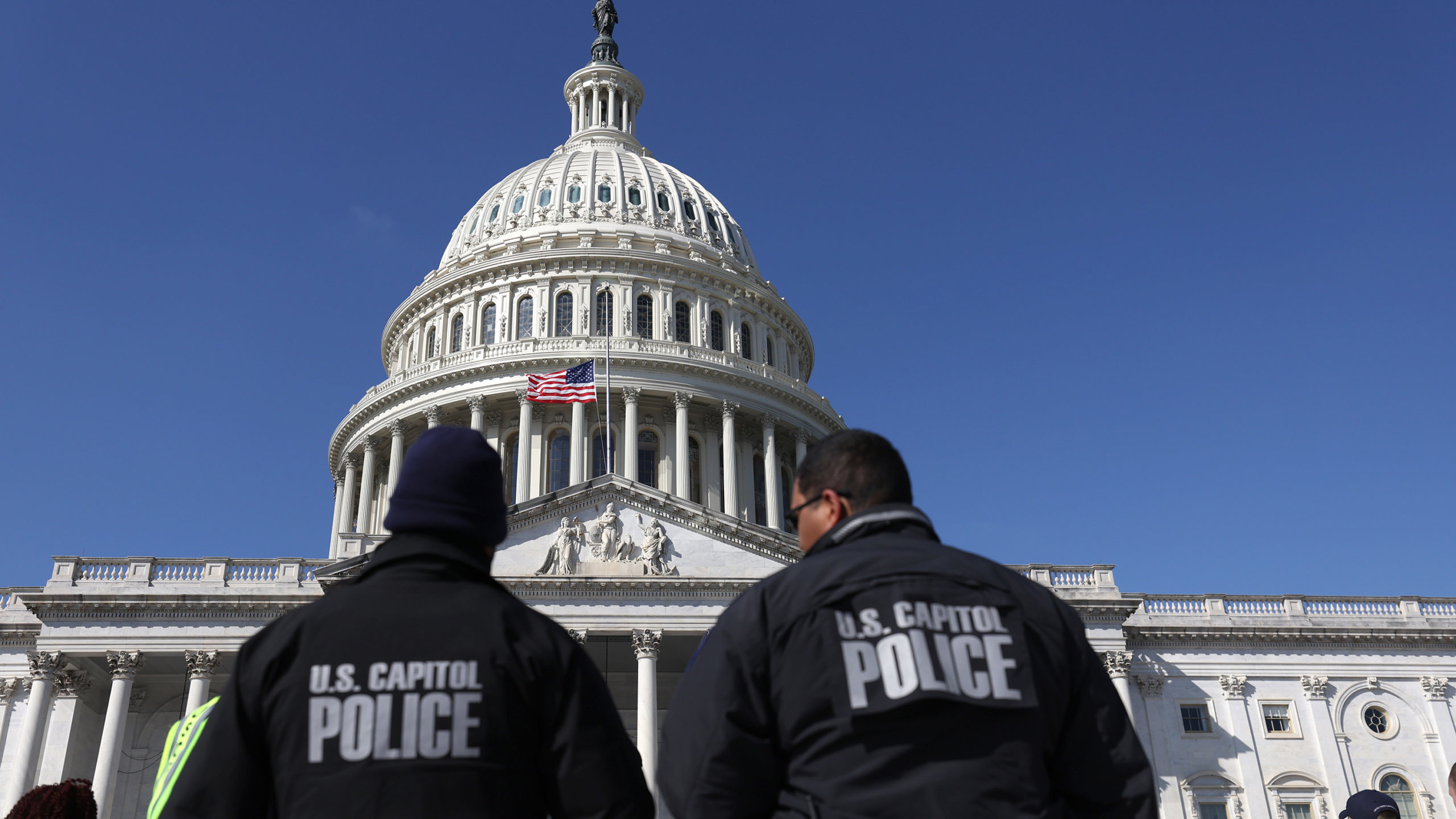 US Capitol police officers gather on the east front plaza of the Capitol in February of 2022 in Was...