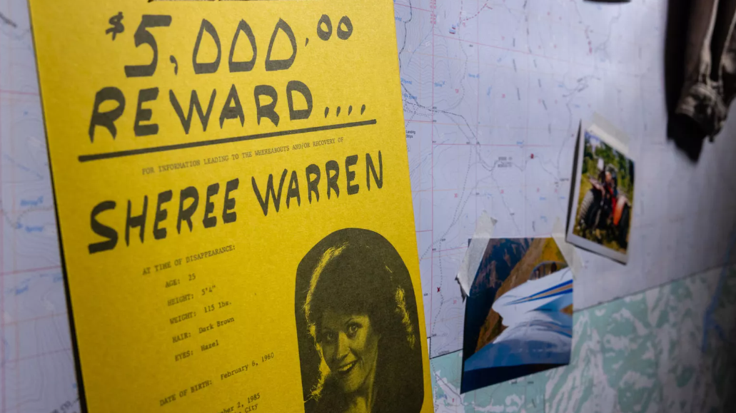 a sign looking for information on Sheree Warren is pictured...