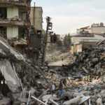Heavily damaged buildings and the debrises of collapsed buildings block the streets on February 23, 2023 in Samandag, Turkey. (Mehmet Kacmaz/Getty Images)