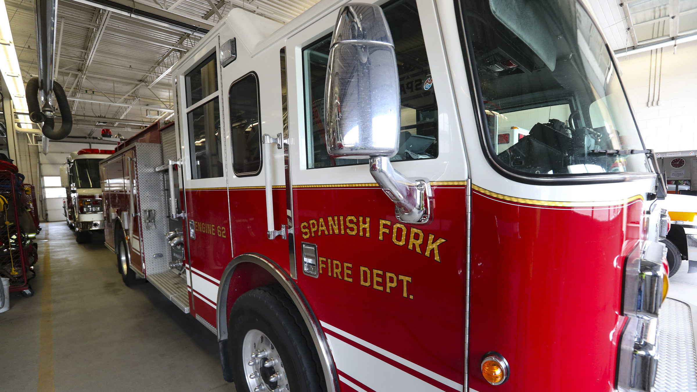 spanish fork fire engine pictured, the crew is responding to a construction site accident...