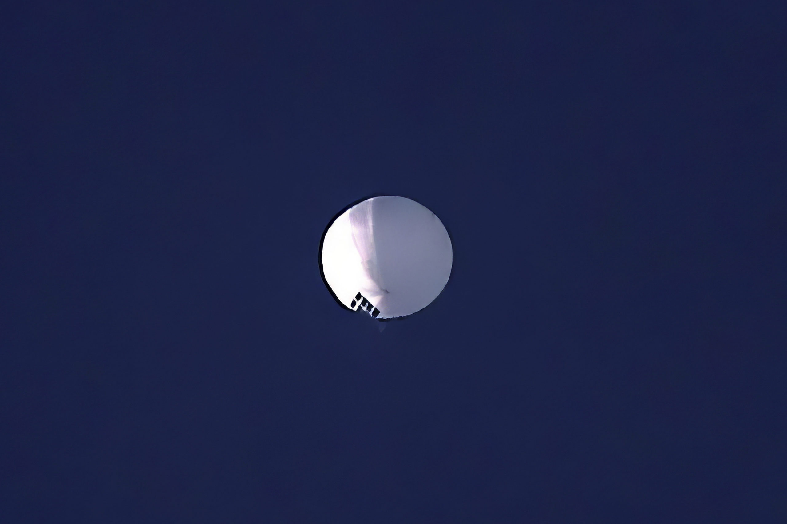 A high altitude balloon floats over Billings, Mont., on Wednesday, Feb. 1, 2023. The huge, high-alt...