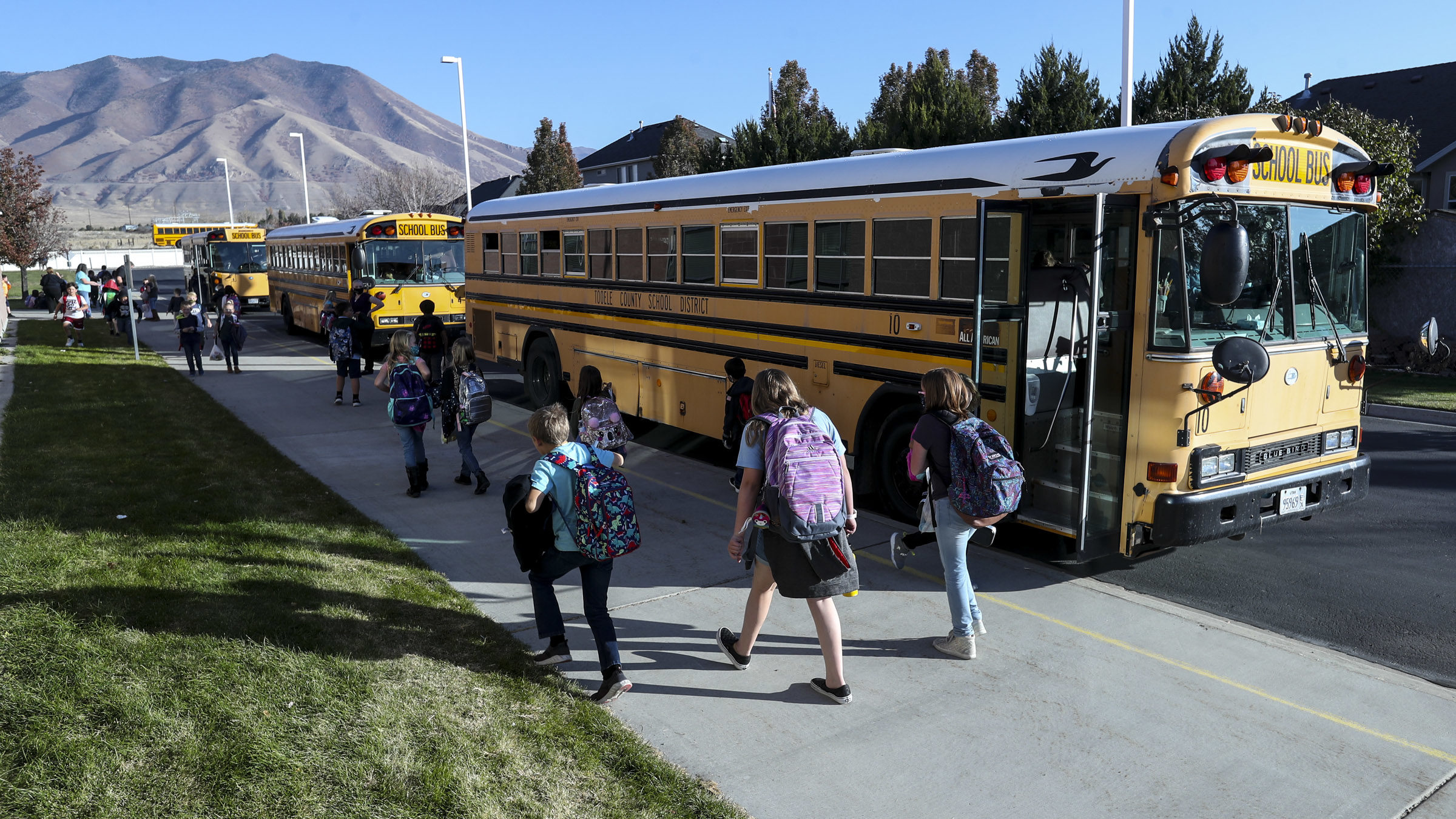 Rose springs elementary students walk to a bus, utah test scores are still recovering...
