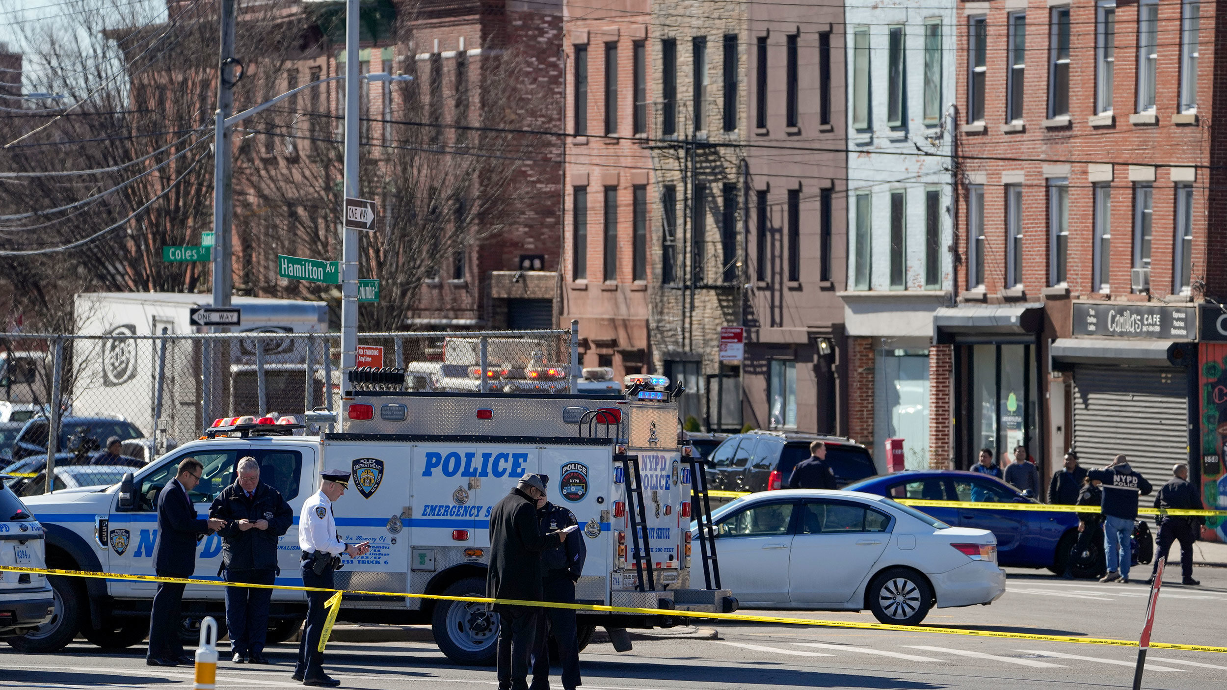 New York Police gather at the scene where a rental truck was stopped and the driver arrested, Monda...