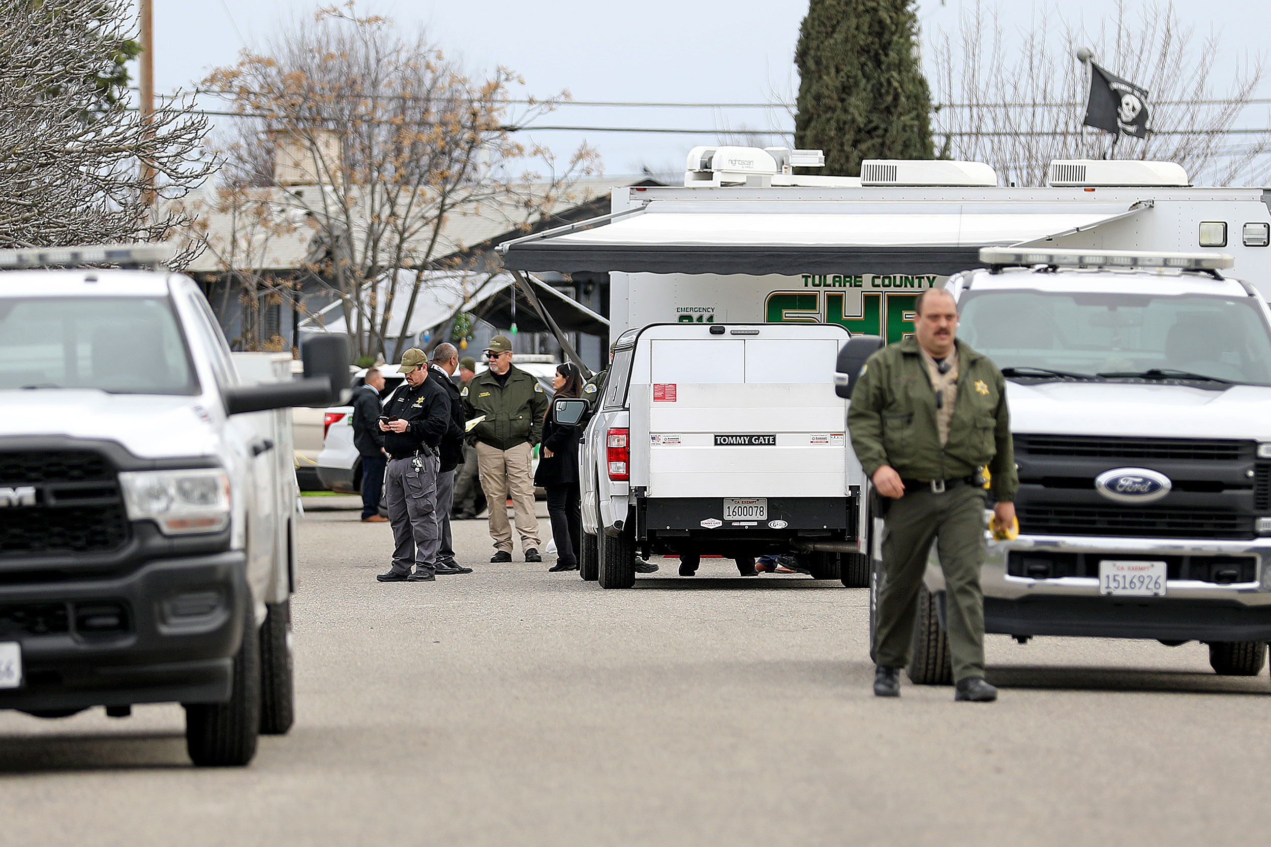 GOSHEN, CA - JANUARY 16: Tulare County Sheriff crime unit investigates the scene where six people, ...