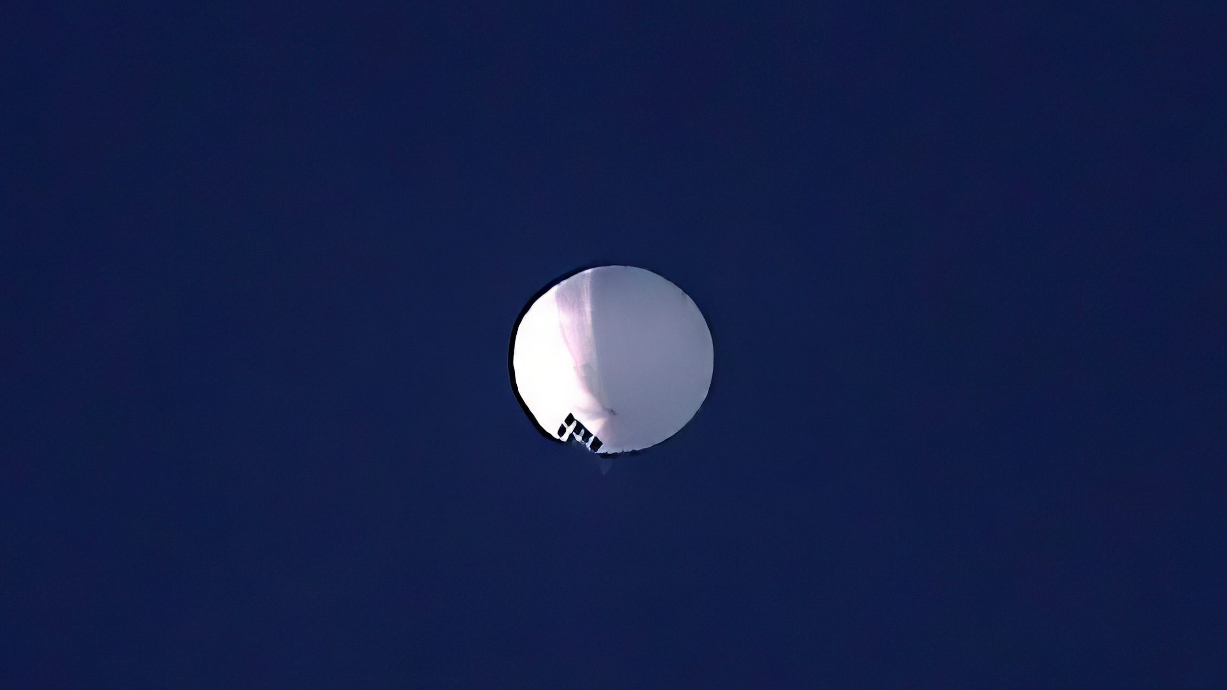 A high altitude balloon floats over Billings, Mont., on Wednesday, Feb. 1, 2023. The U.S. is tracki...