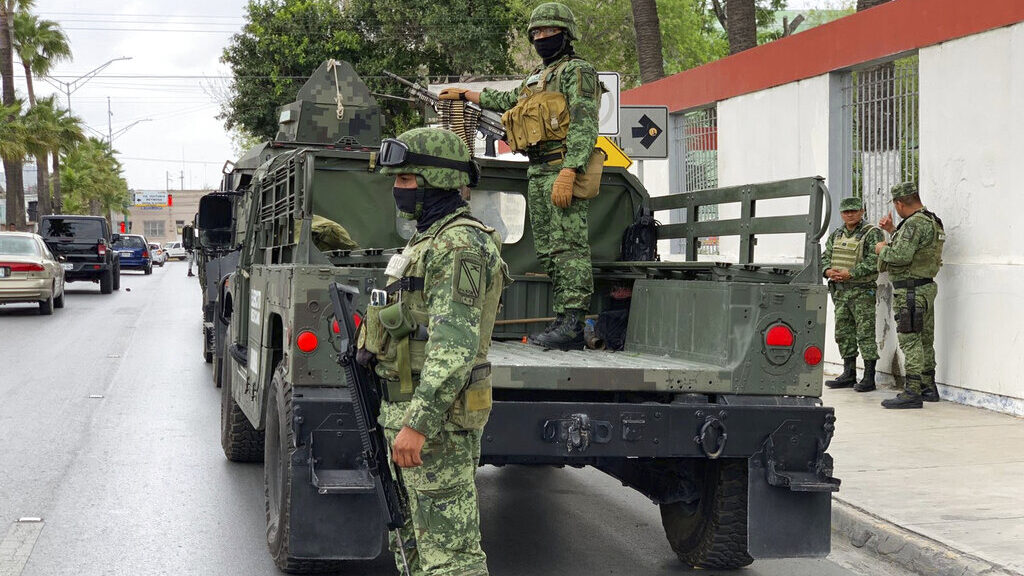 Mexican army soldiers prepare a search mission for four U.S. citizens kidnapped by gunmen in Matamo...