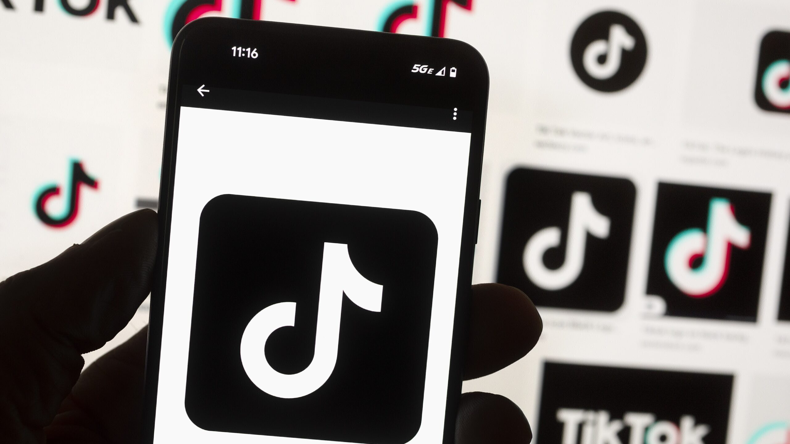 tiktok logo pictured, a possible ban is looking...