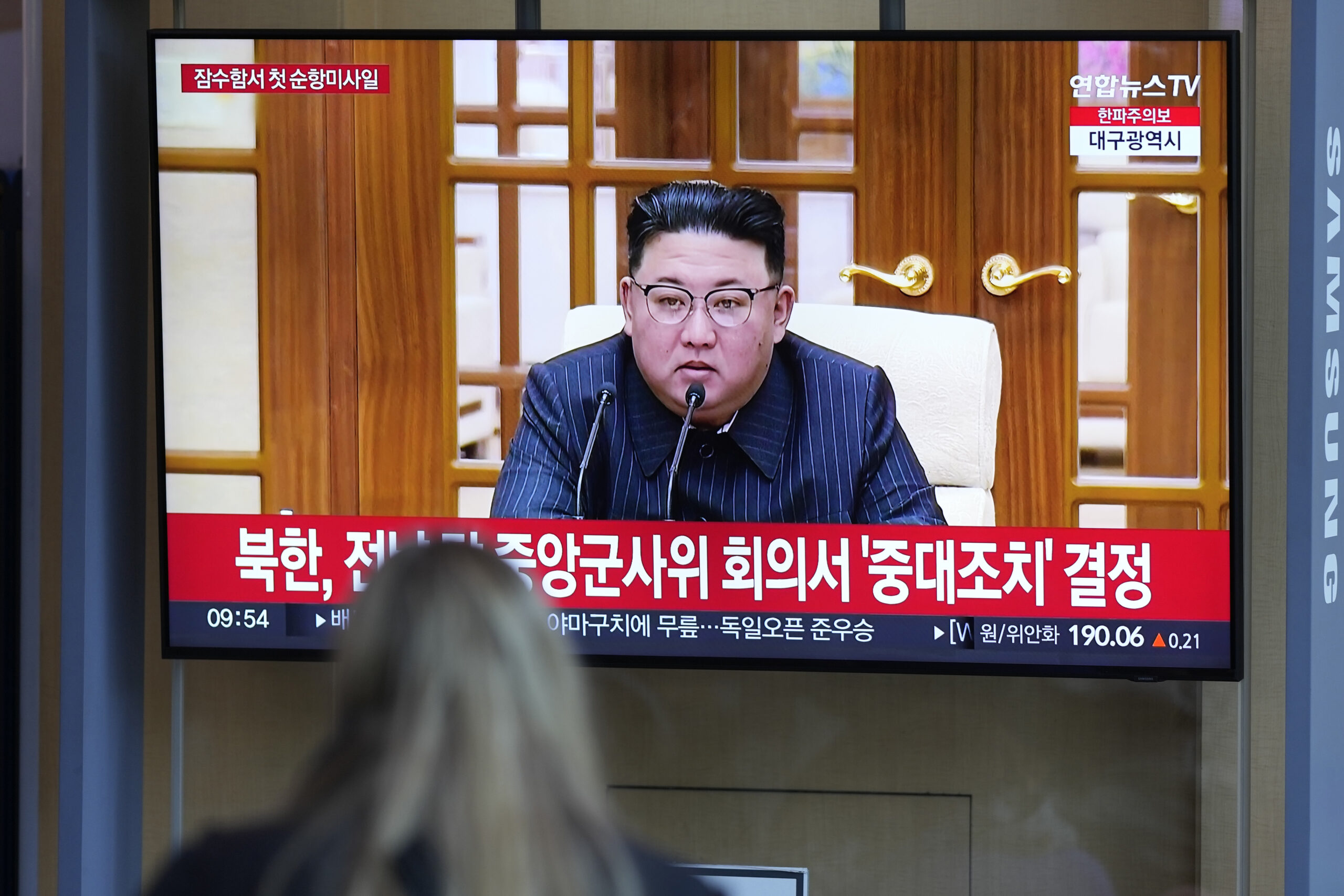 FILE - A TV screen shows an image of North Korean leader Kim Jong Un during a news program at the S...