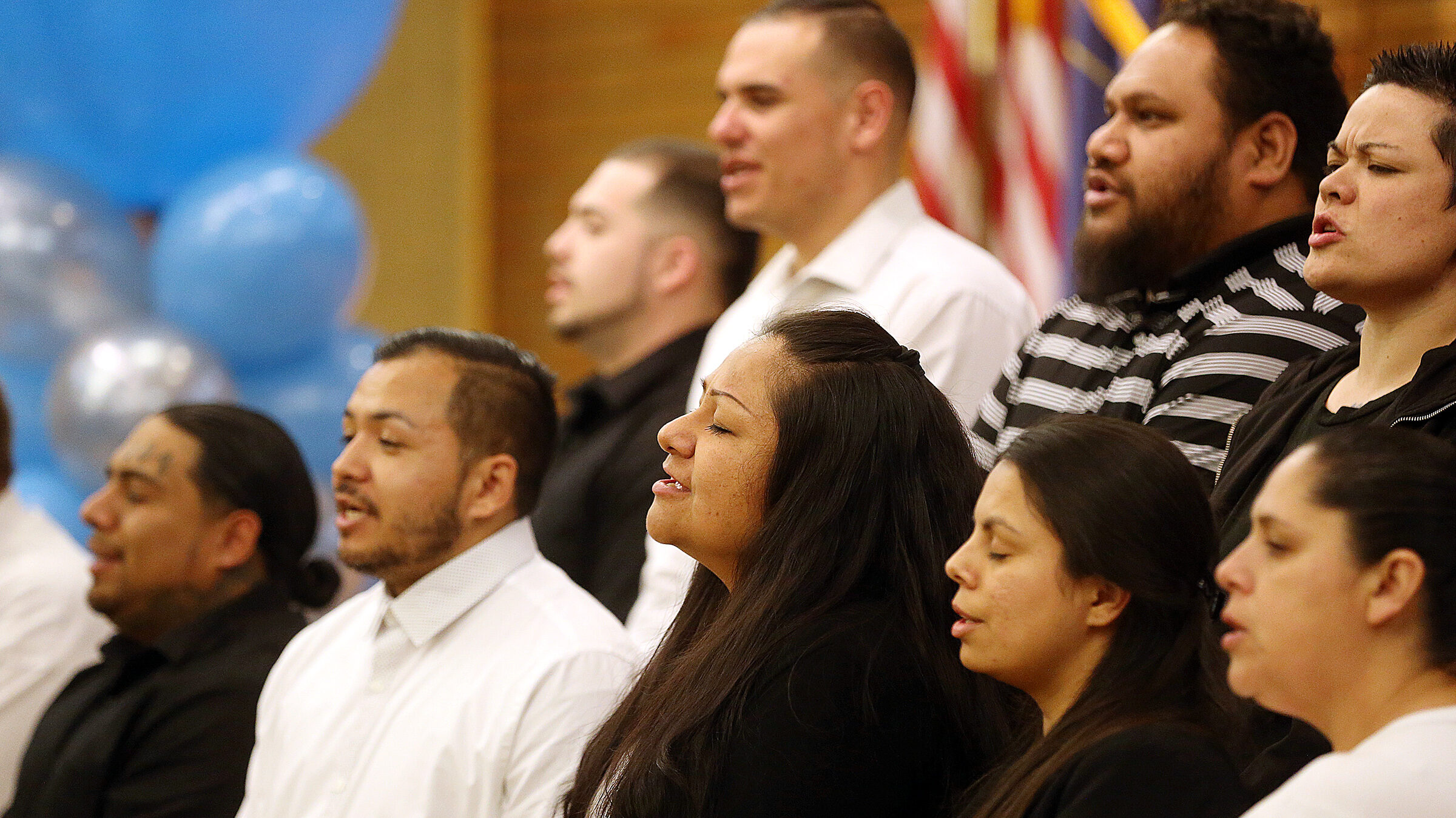 a choir sings, a new religious study explored likeability of different faiths...