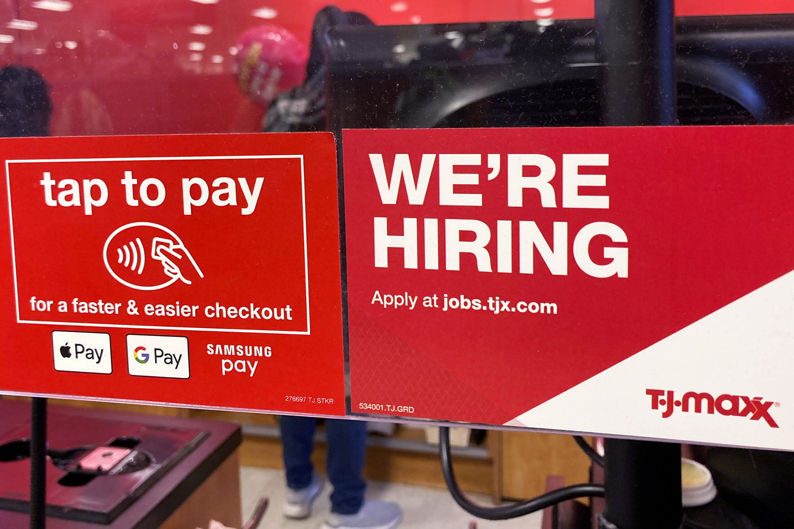 FILE - A hiring sign is displayed at a retail store in Mount Prospect, Ill., Friday, Jan. 13, 2023....