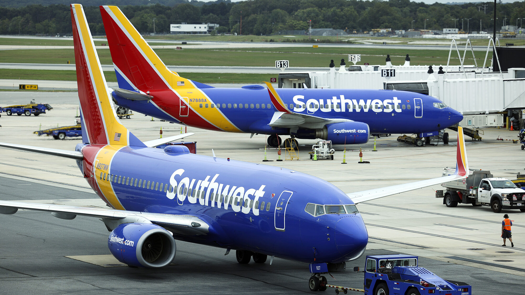 An off-duty pilot stepped in to help after a Southwest pilot became ill during a flight, the airlin...