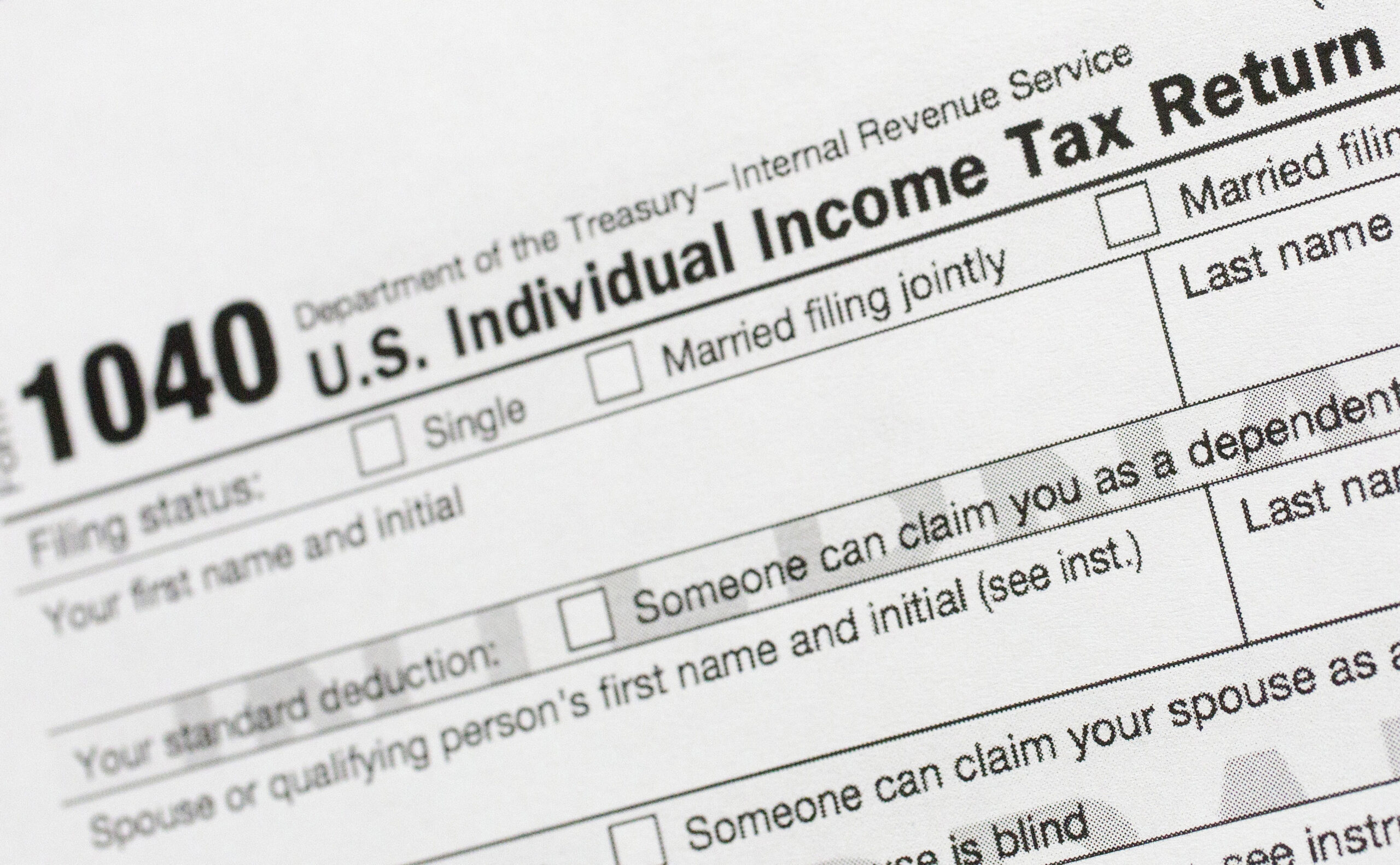 FILE - A portion of the 1040 U.S. Individual Income Tax Return form is shown July 24, 2018, in New ...