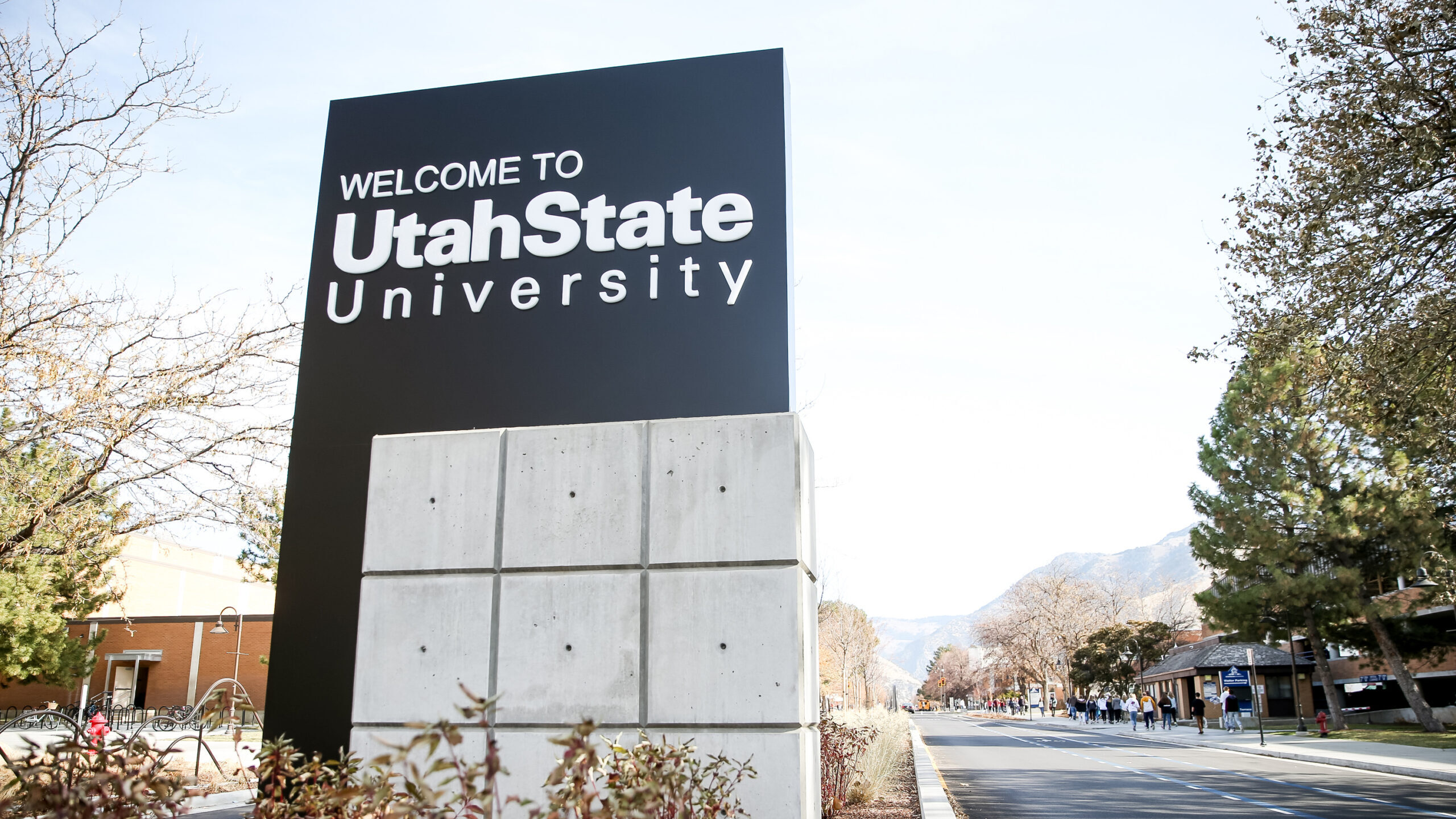 usu sign pictured, colleges in utah are tackling dei initiatives...