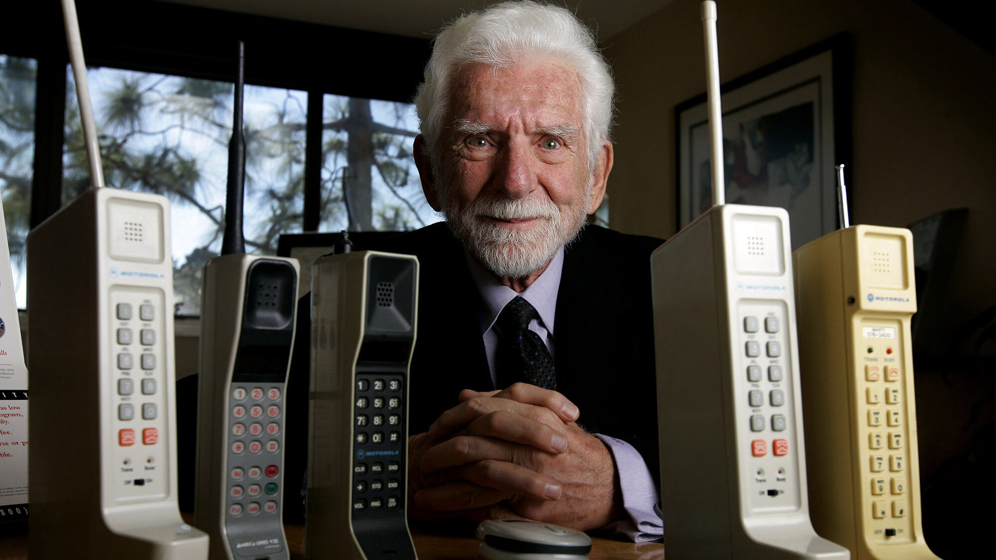 Martin Cooper, who developed the first portable cellphone, warned against dialing and driving in hi...