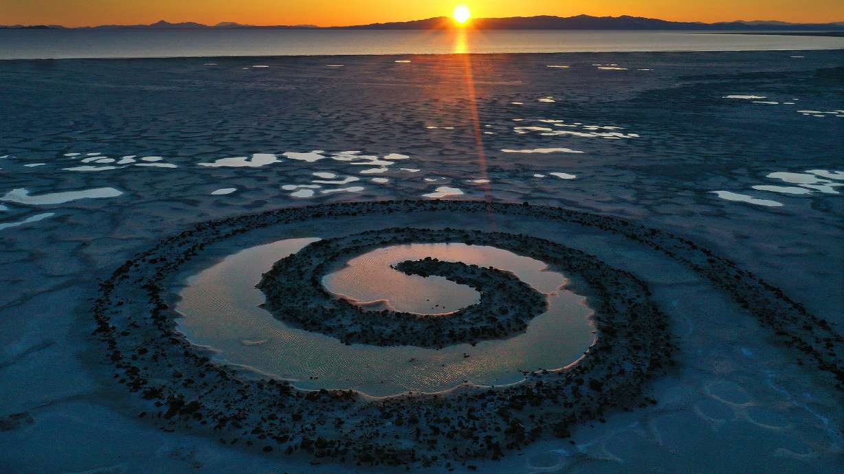 The sun sets on the Spiral Jetty on the Great Salt Lake on March 16. Utah Gov. Spencer Cox nominate...