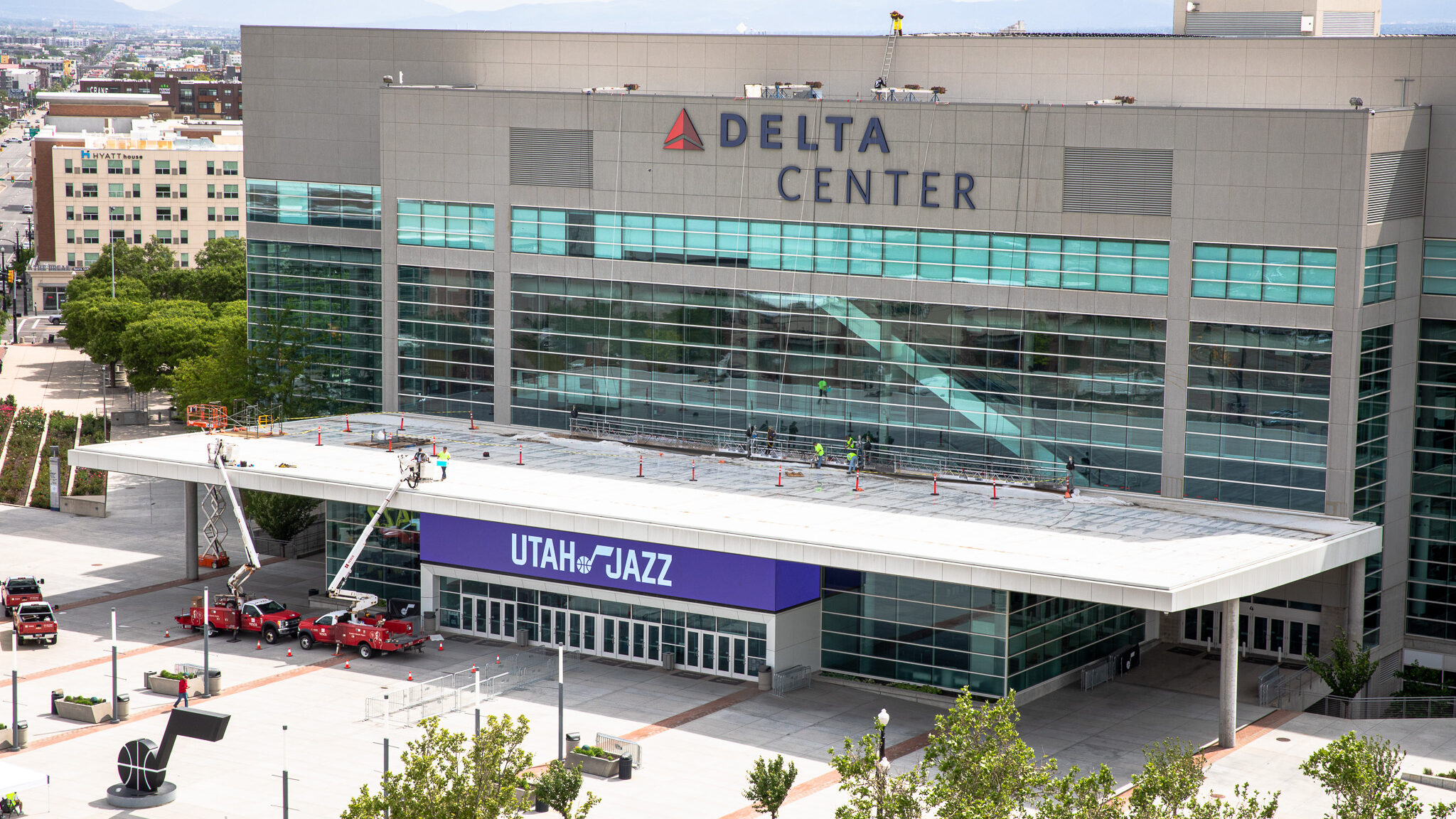 Crews finish placing the Delta Center name on the former Vivint Arena in Salt Lake City, on May 25,...