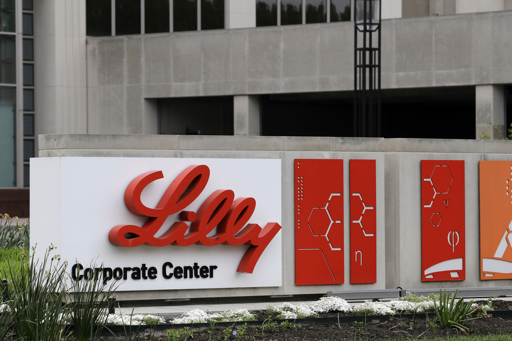 FILE - A sign for Eli Lilly & Co. sits outside their corporate headquarters in Indianapolis on ...