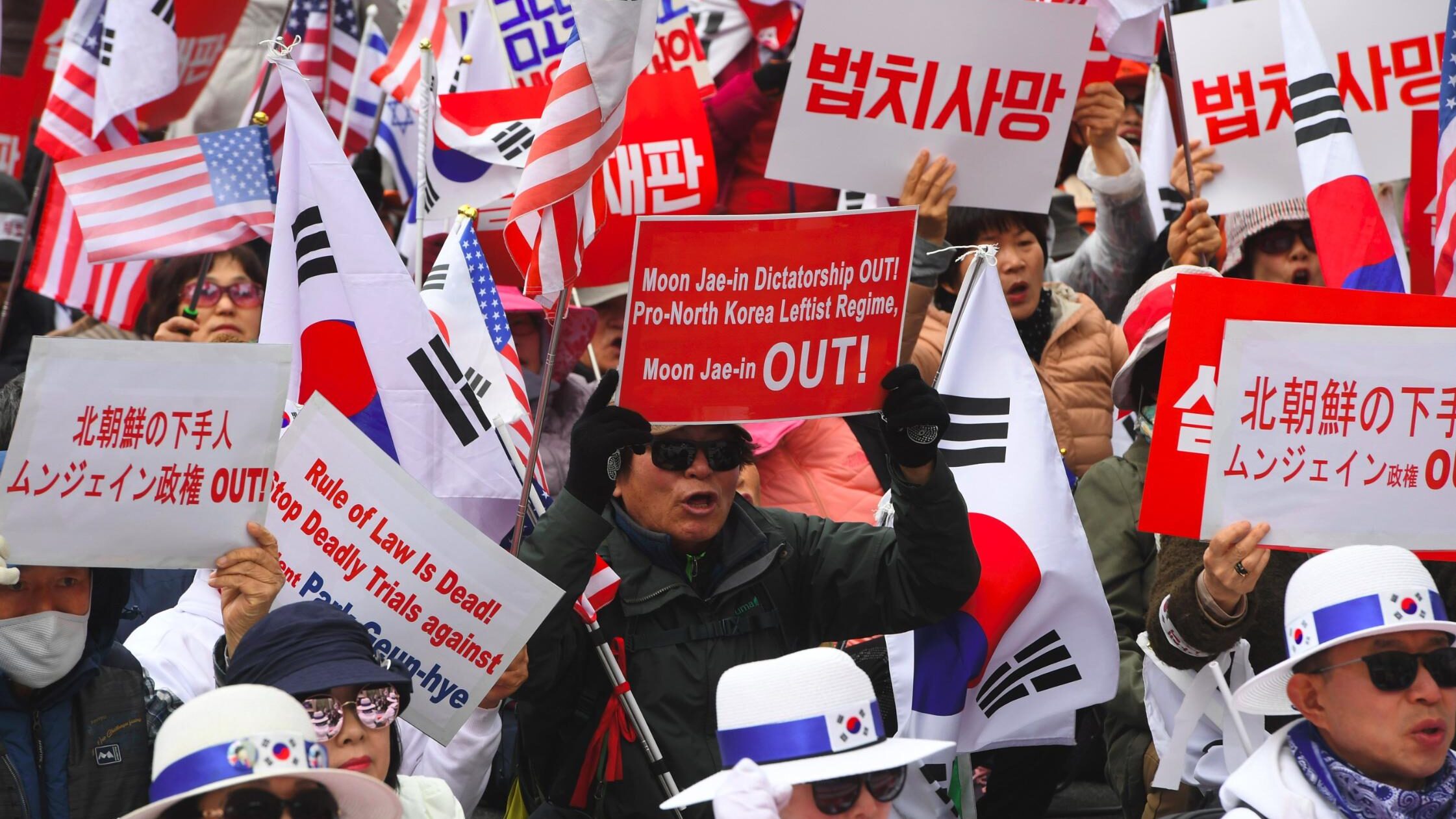 Supporters of South Korea's former president Park Geun-hye hold a rally demanding her release outsi...