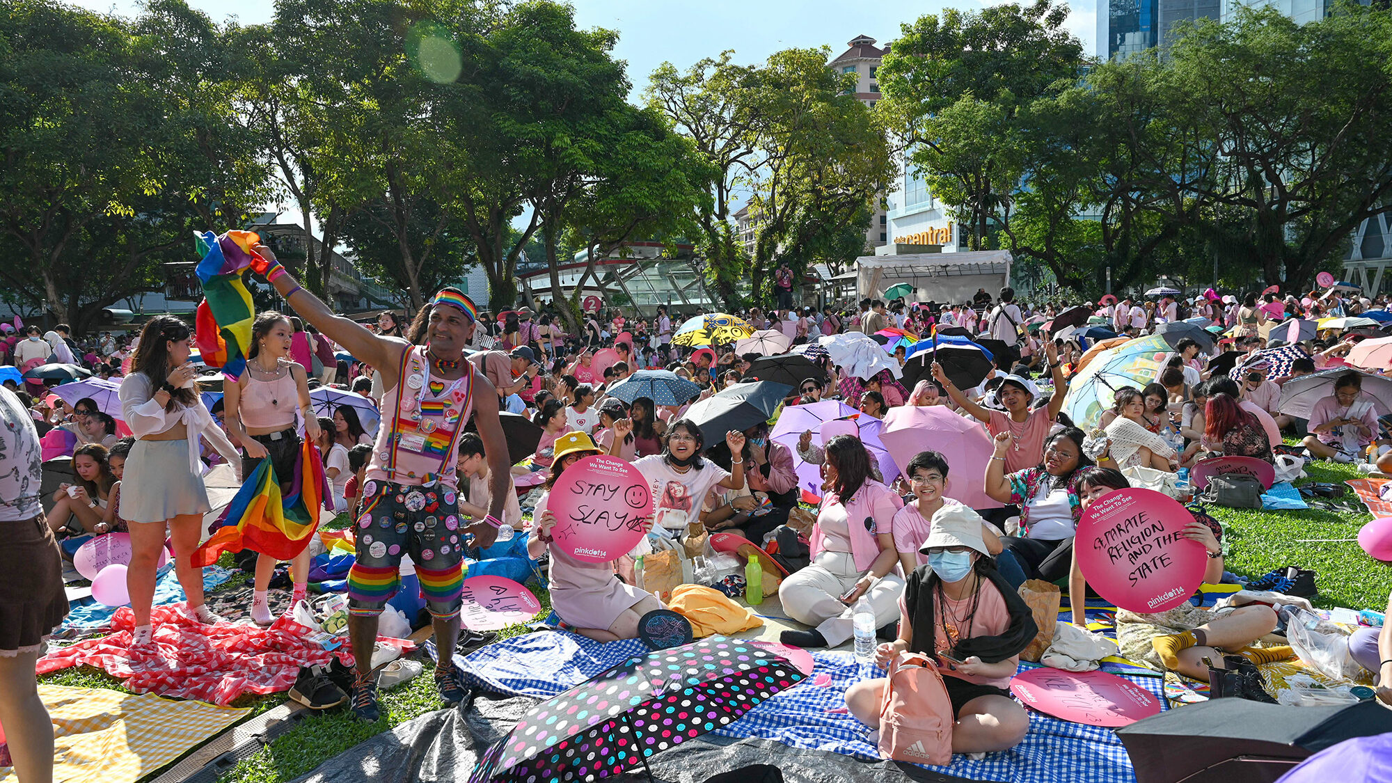 Gay rights supporters attend the annual Pink Dot event in Singapore in June 2022. Photo credit: Ros...